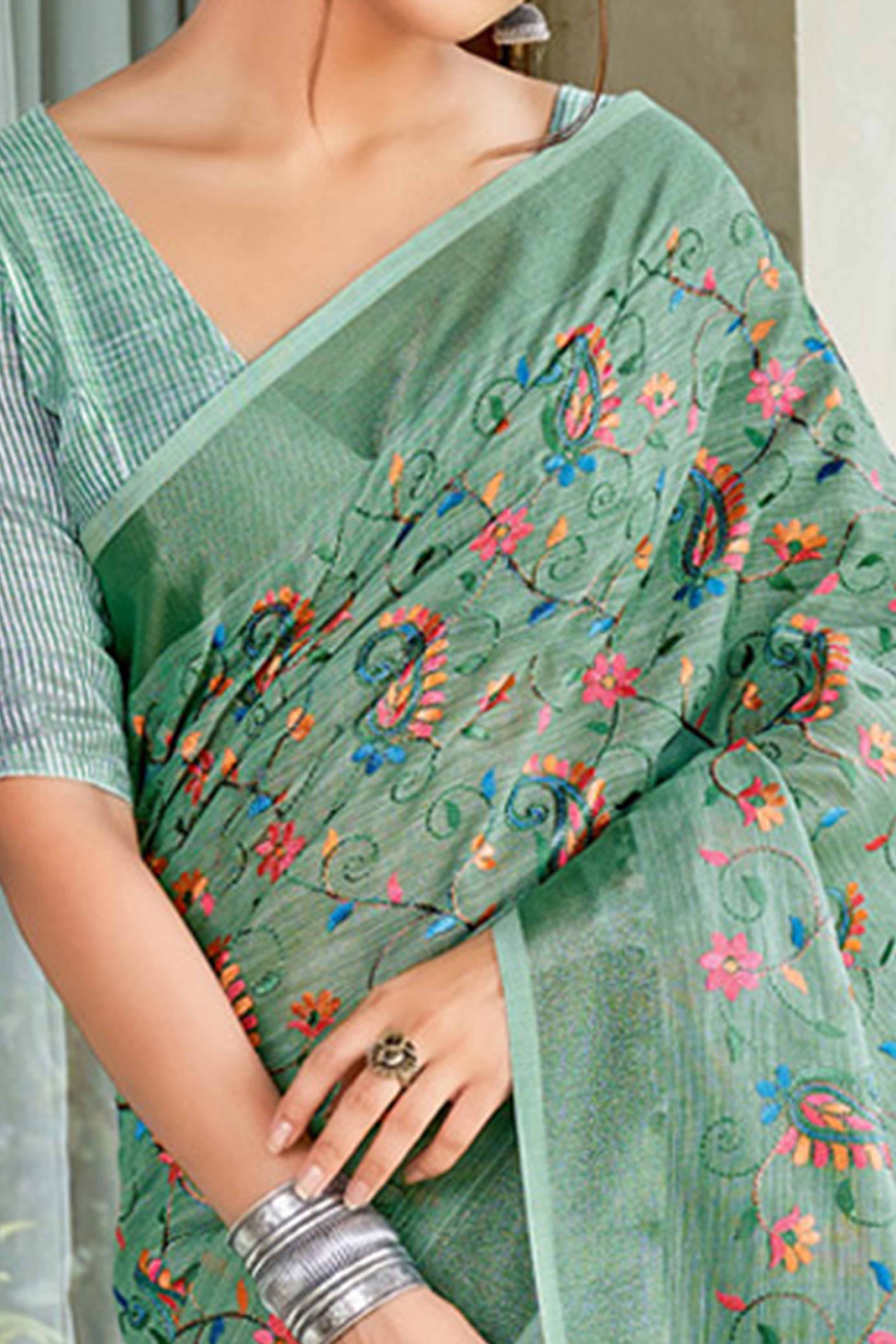 Handwoven Sea Green Linen Saree with Floral Embroidered Patterns