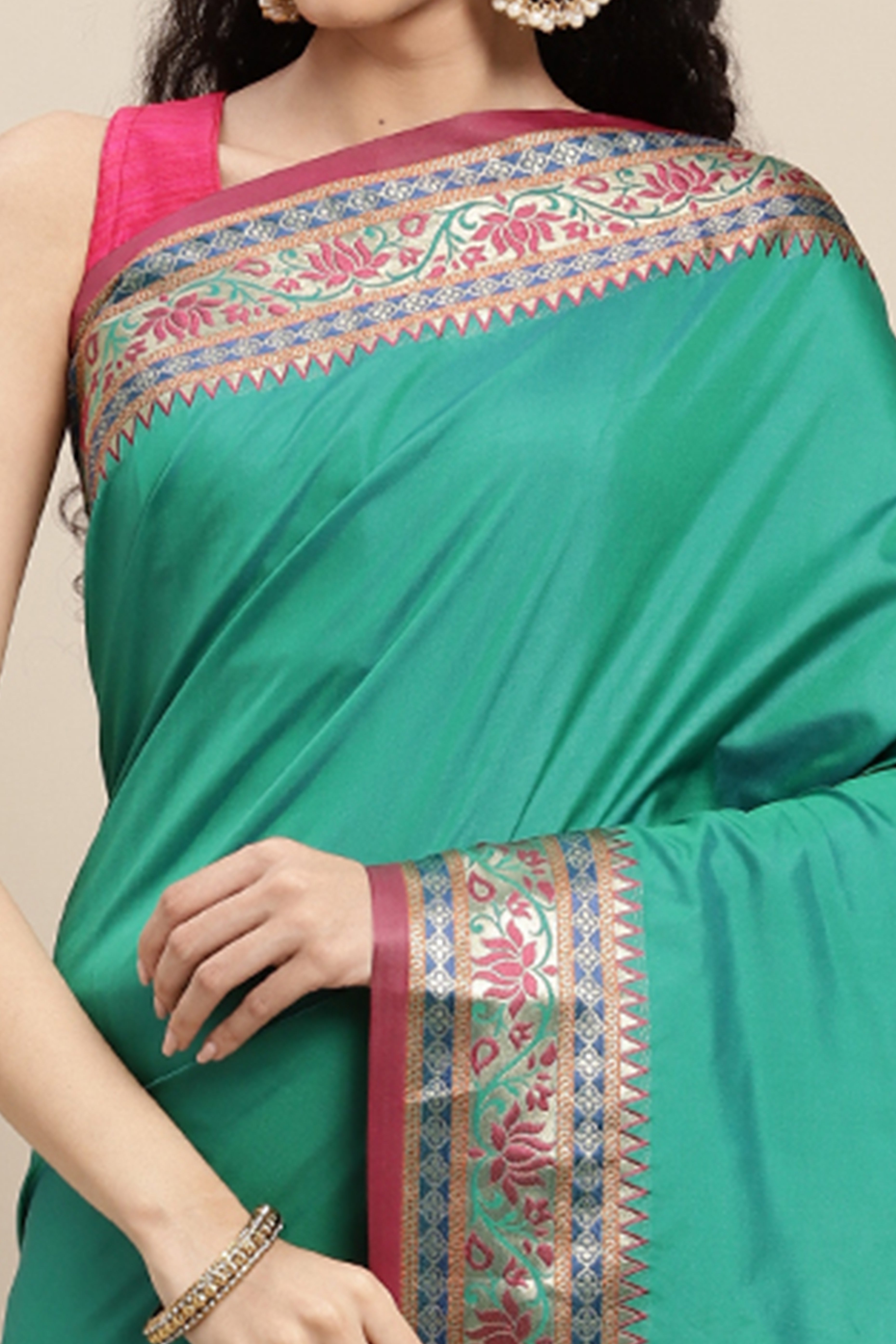 Graceful Rama Green Solid Saree Highlighted With Floral Zari Weaving On Silk Blend & Tassel Pallu