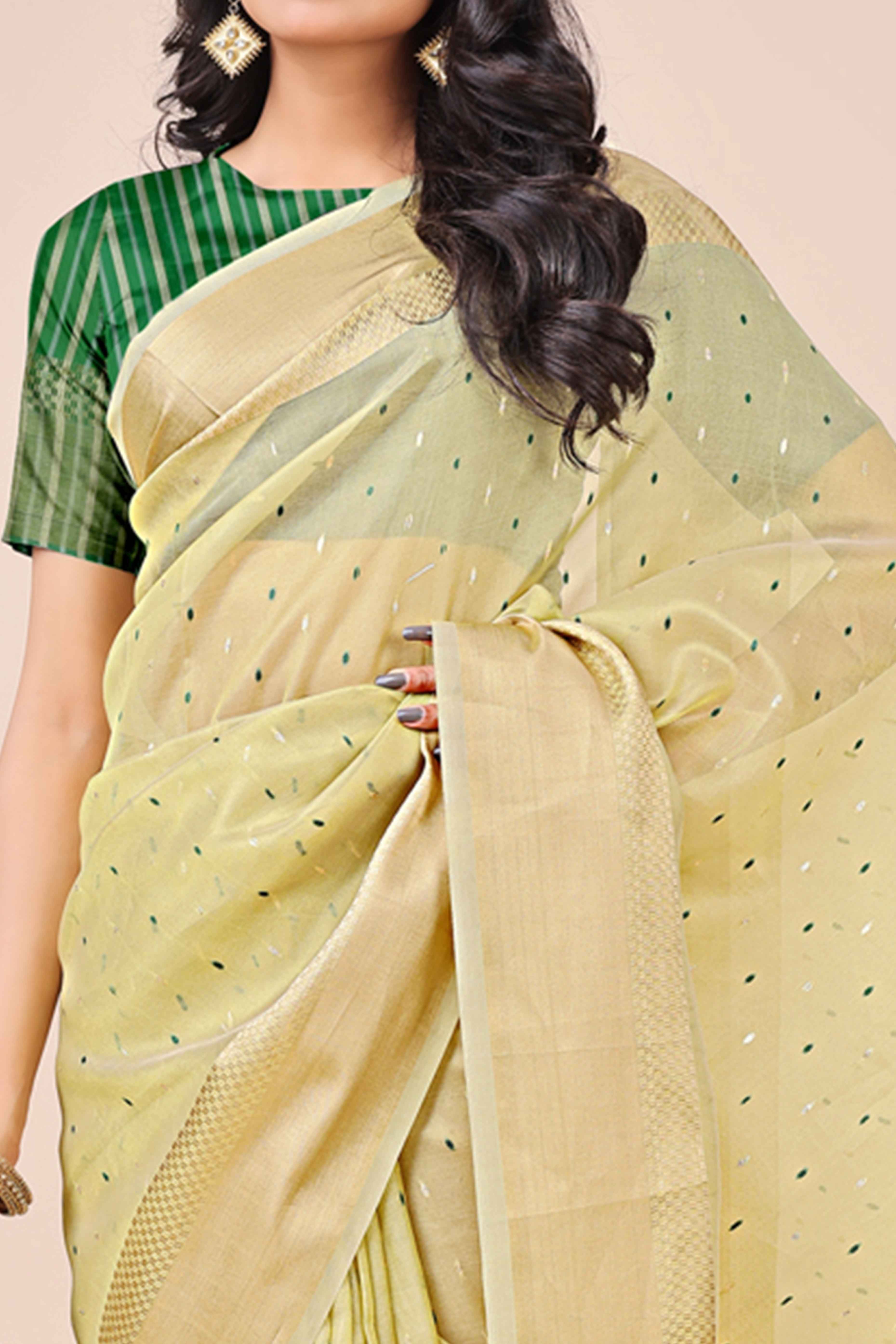 Light Green Organza Saree Adorned With Fine Zari Weaving & Stylish Tassel Edging