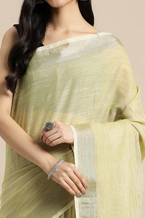 Olive Green Linen Saree Adorned With Silver Zari Weaving Border & Pallu