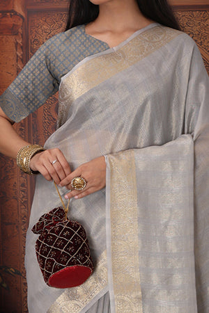 Grey Organza Saree Adorned With Floral Zari Weaving & Graceful Tassel Pallu