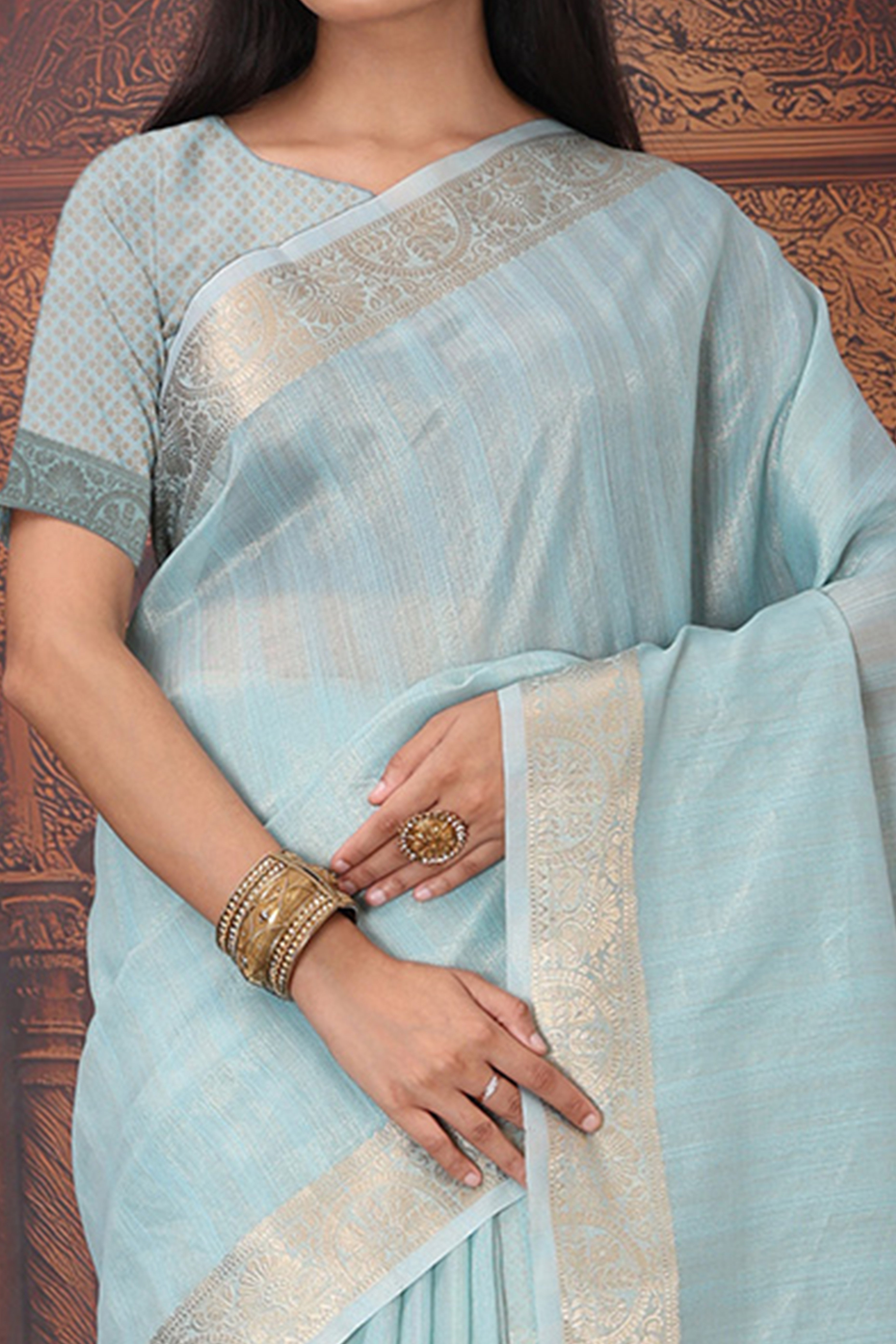 Sky Blue Organza Saree Adorned With Floral Zari Weaving & Graceful Tassel Pallu