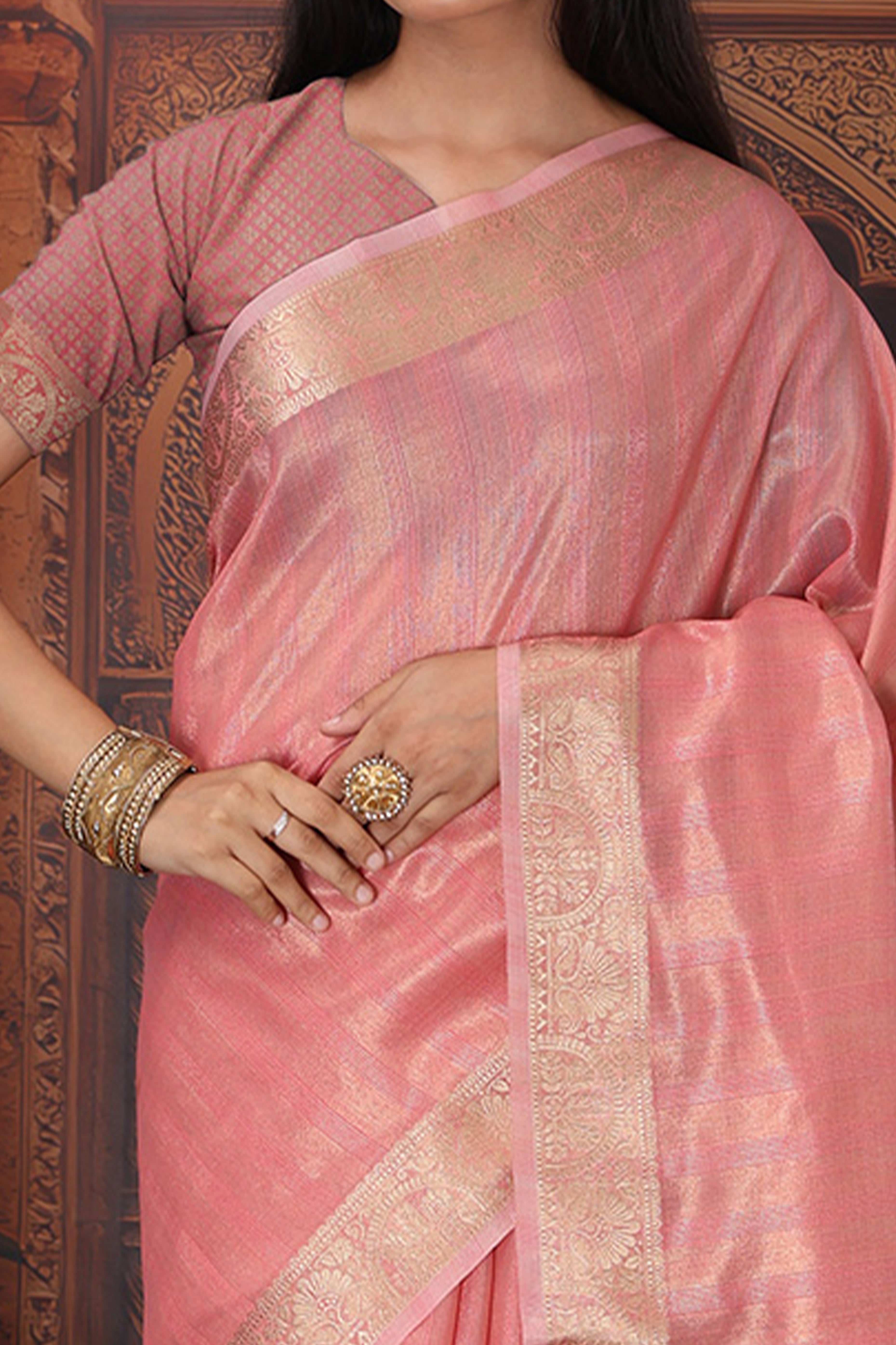 Blush Pink Organza Saree Adorned With Floral Zari Weaving & Graceful Tassel Pallu