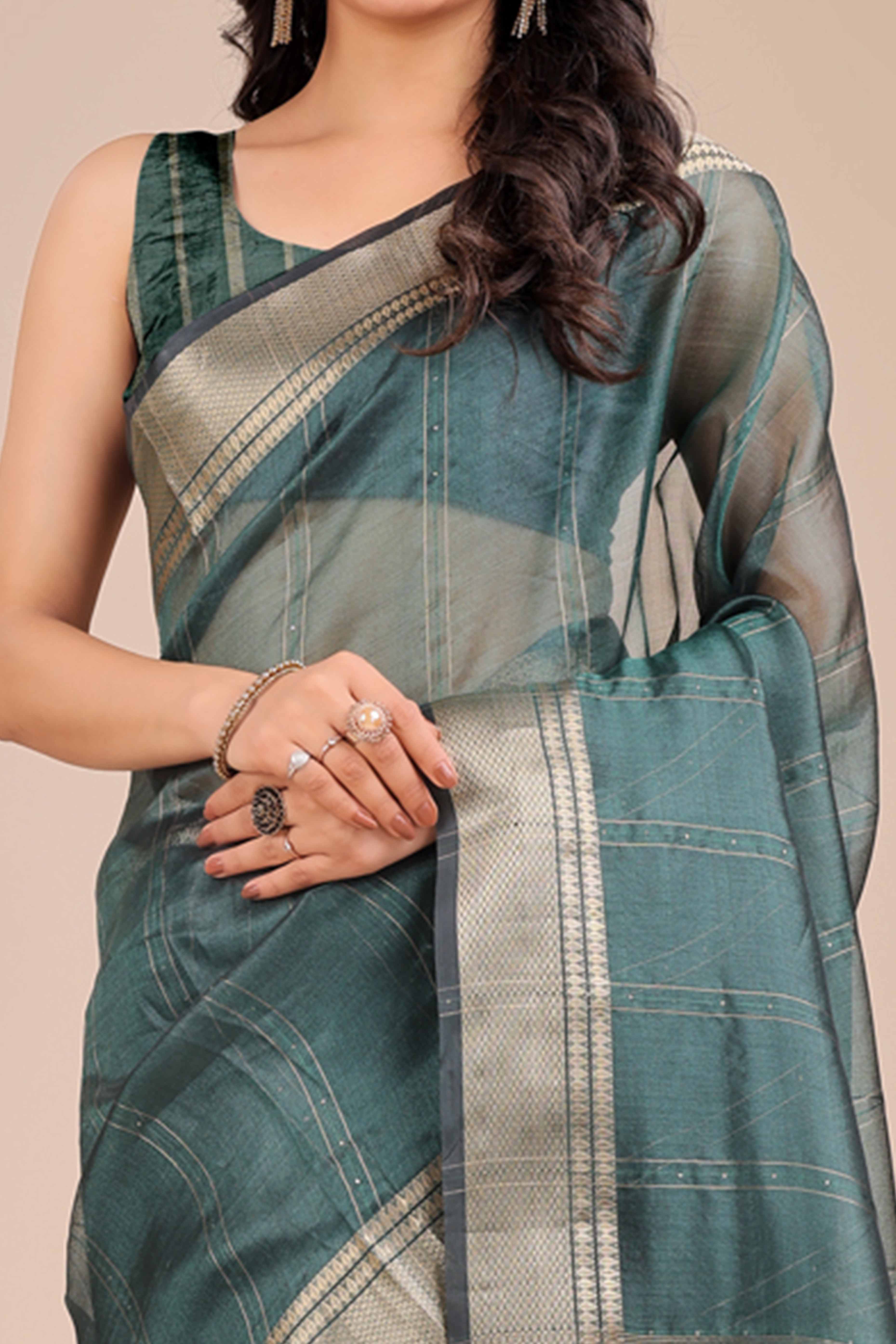 Dark Green Hue Organza Saree with Shimmering Zari Border Weave