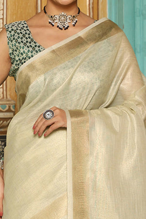 Minimalist Cream Linen Saree with Elegant Green Pallu in Handloom Weave Look