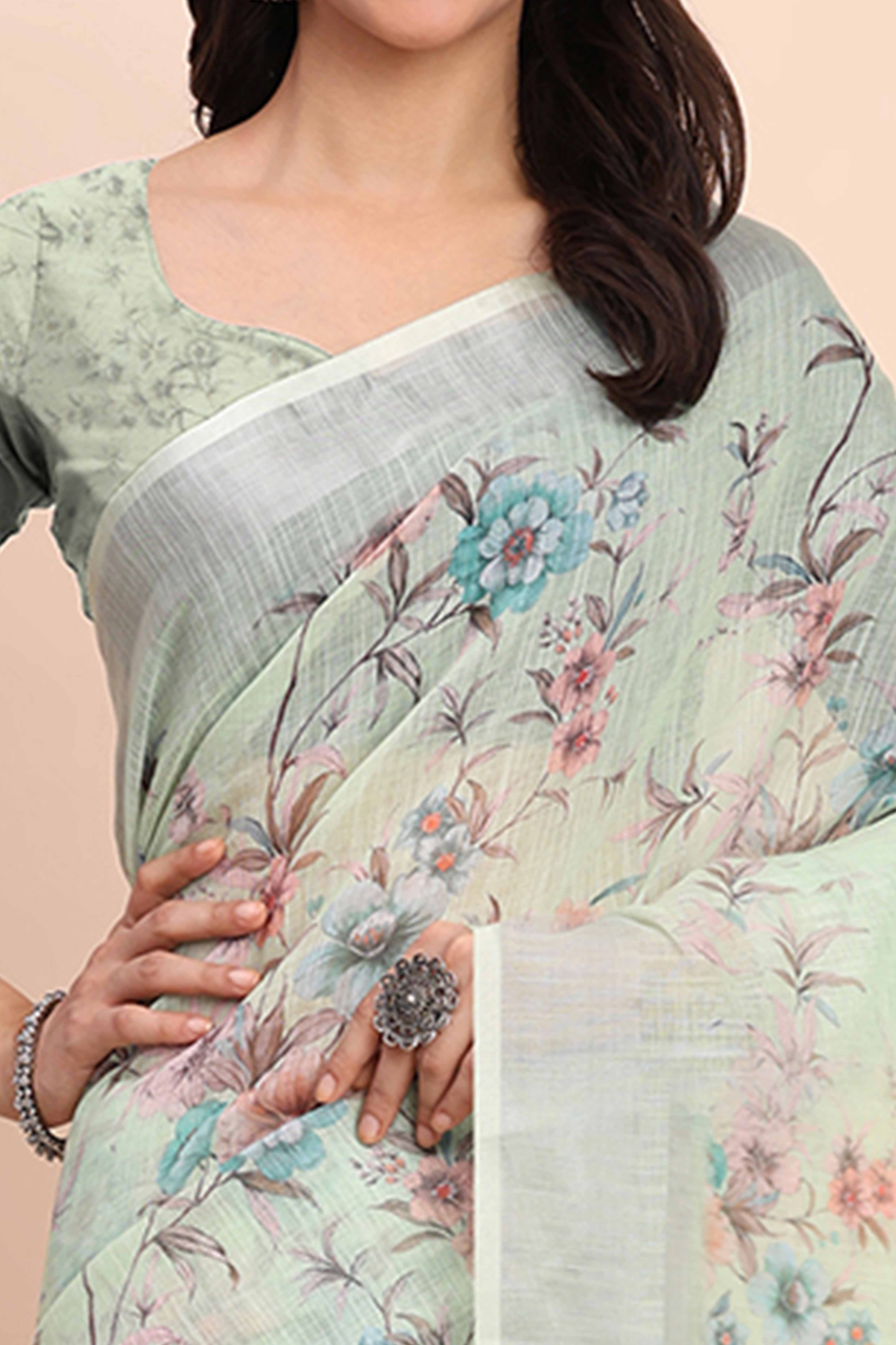 Light Green Linen Cotton Saree Featuring Floral Prints & Woven Border