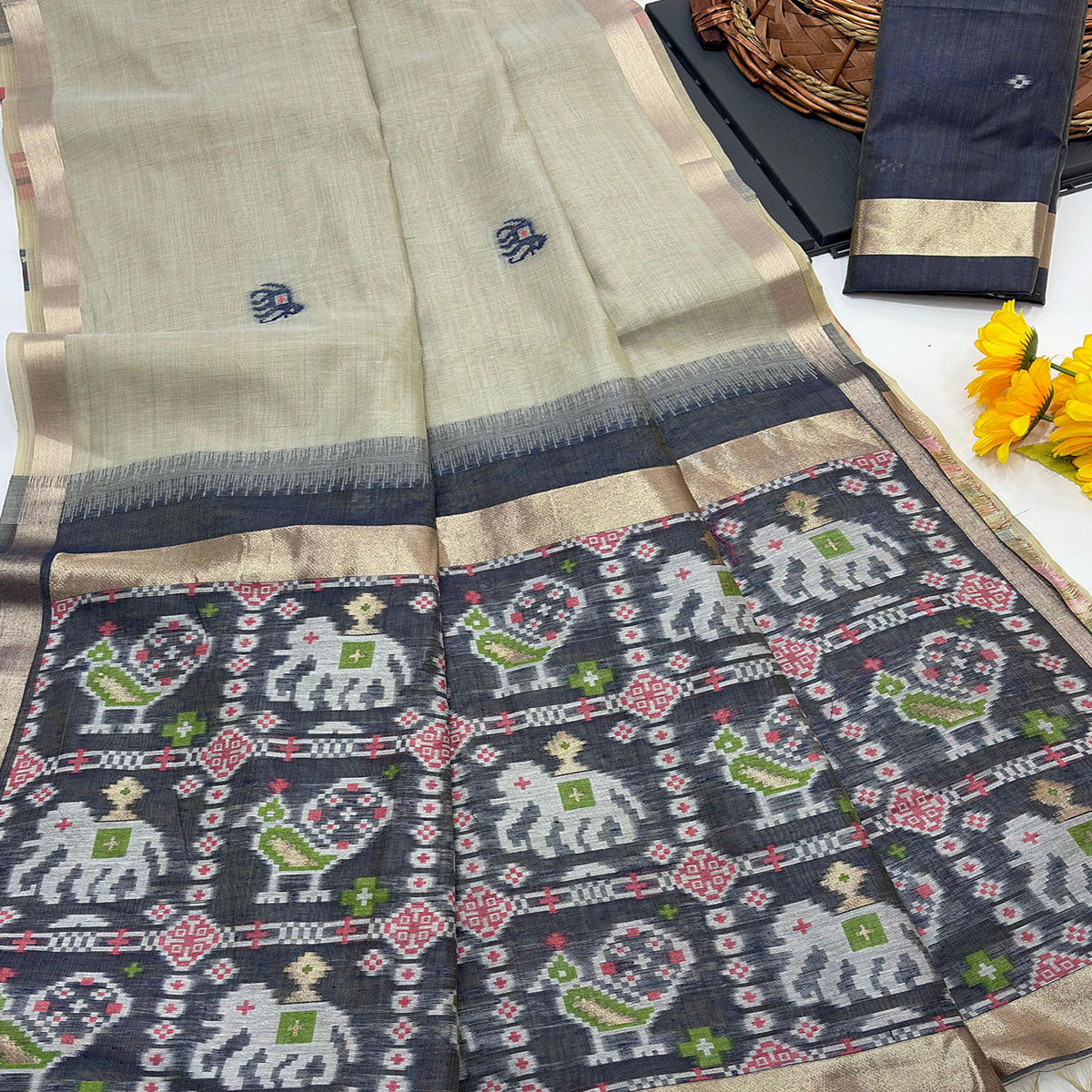 Beige Muga Cotton Silk Saree with Traditional Patola Woven Pallu Design