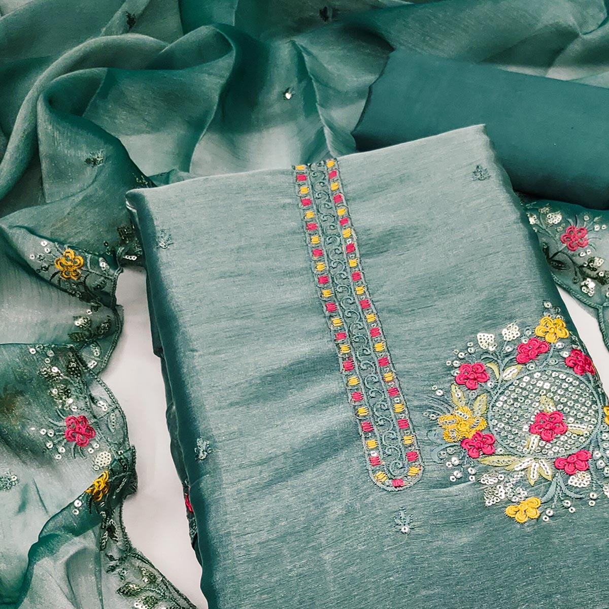Graceful Rama Green Silk Blend Dress Material Featuring Exquisite Floral Embroidery & Sequin Accent