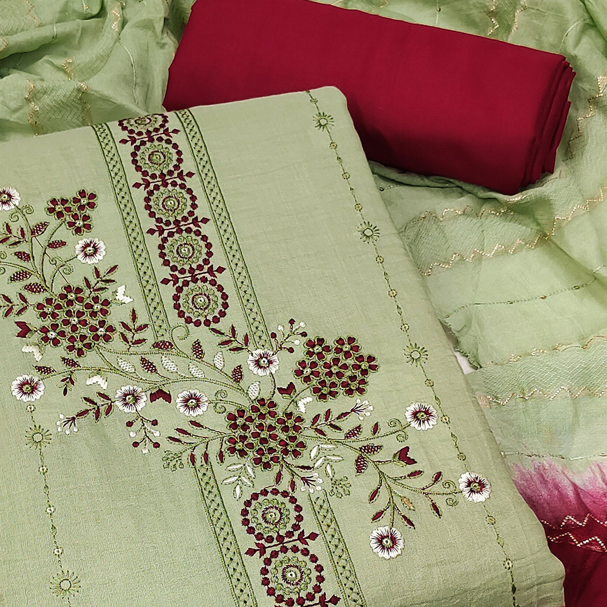 Graceful Green Cotton Blend Dress Material With Embroidered Florals And Sequin Accents