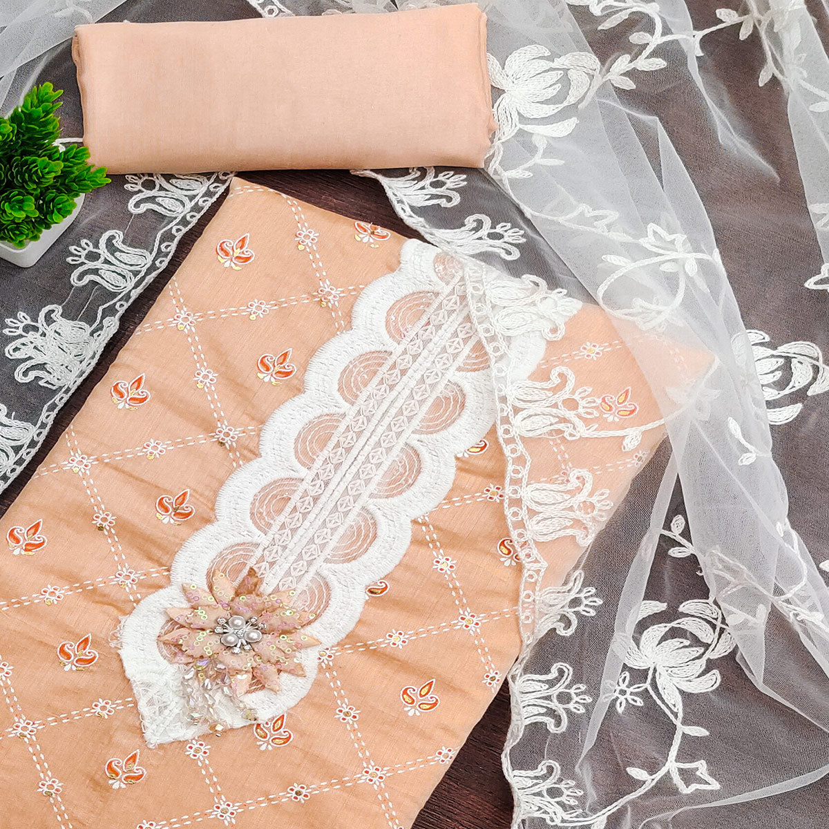 Light Orange Unstitched Dress Material Featuring Fine Floral Embroidery on Chanderi Silk