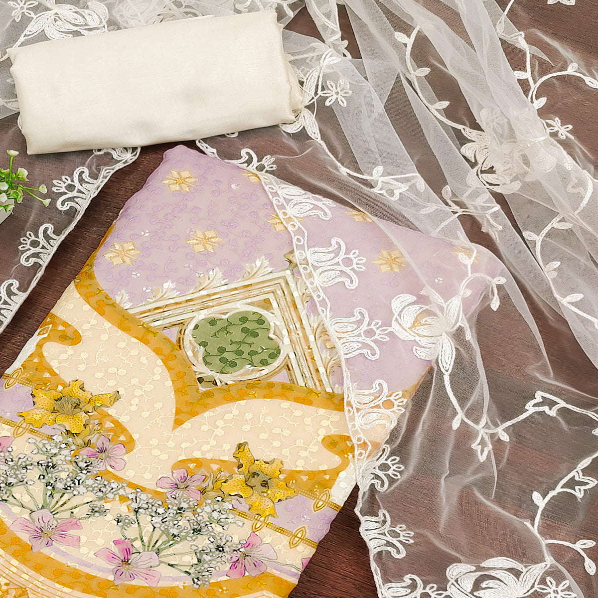 Cream & Lavender Georgette Suit Fabric Adorned with Elegant and Delicate Schiffli Embroidery