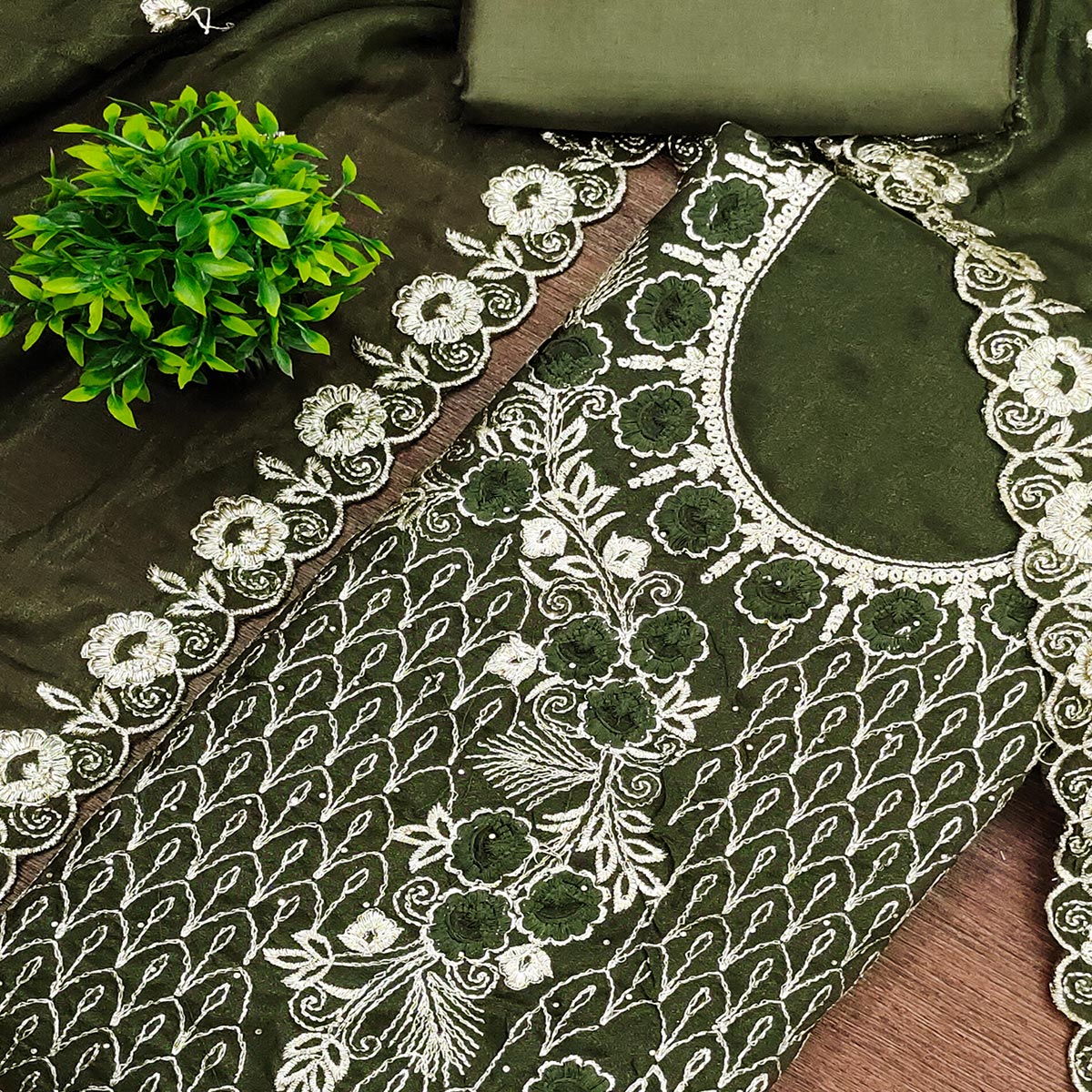 Green Georgette Dress Material Decorated with Artistic Thread Embroidery Designs
