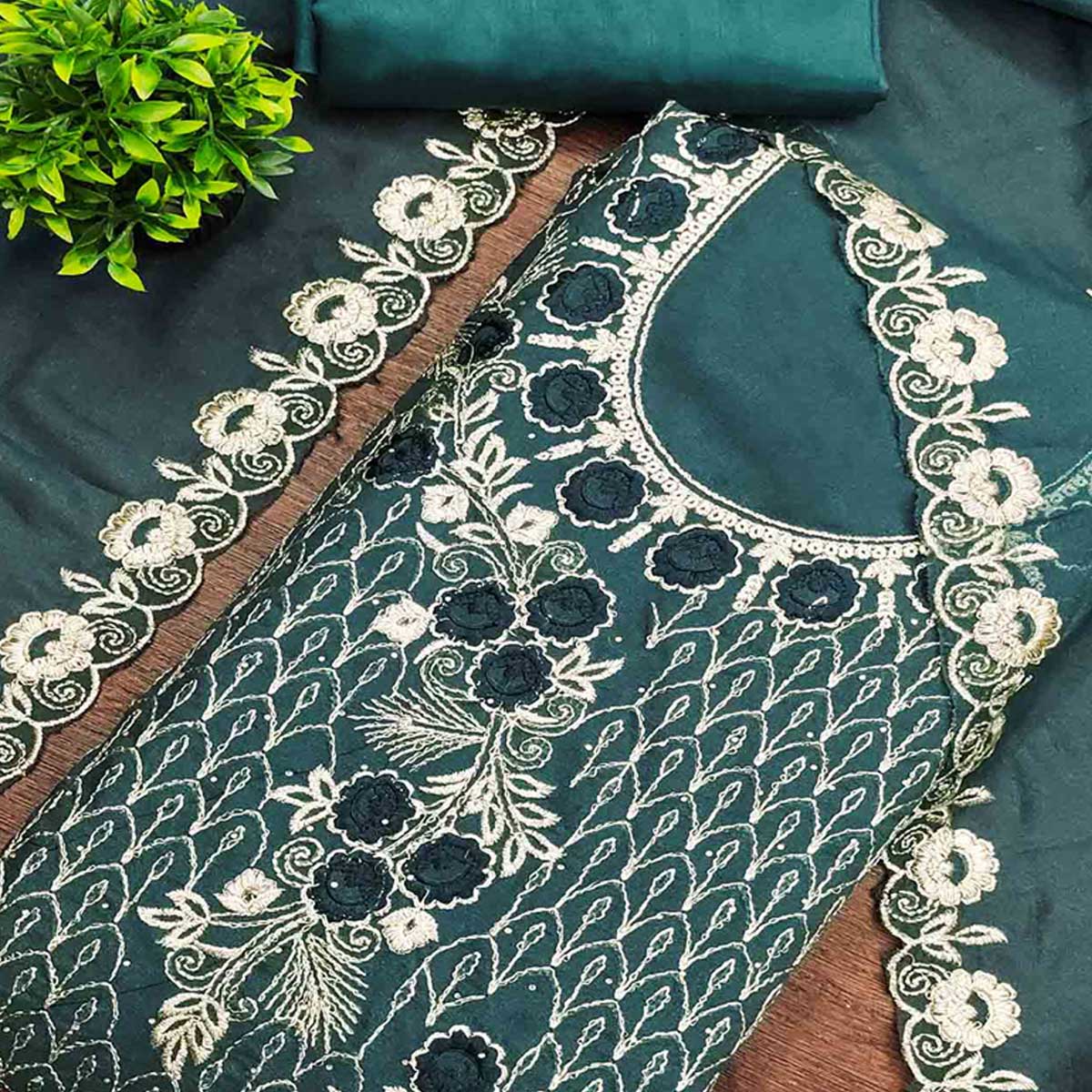 Morpich Green Georgette Dress Material Decorated with Artistic Thread Embroidery Designs