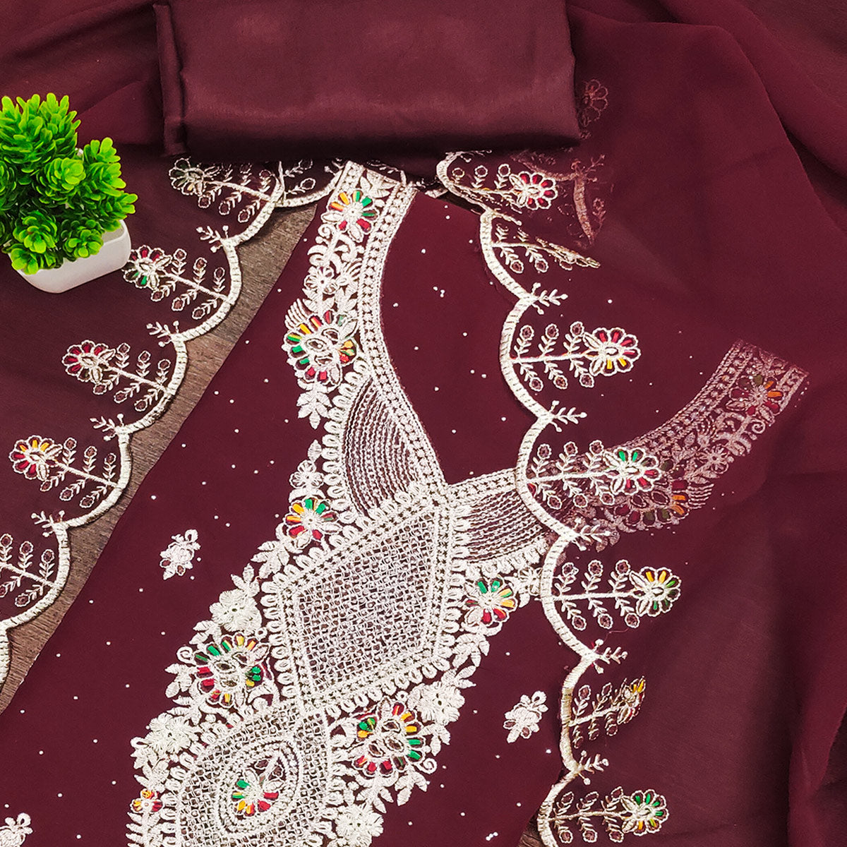 Maroon Georgette Dress Material Adorned With Elegant Floral Embroidery & Shimmering Swarovski Work
