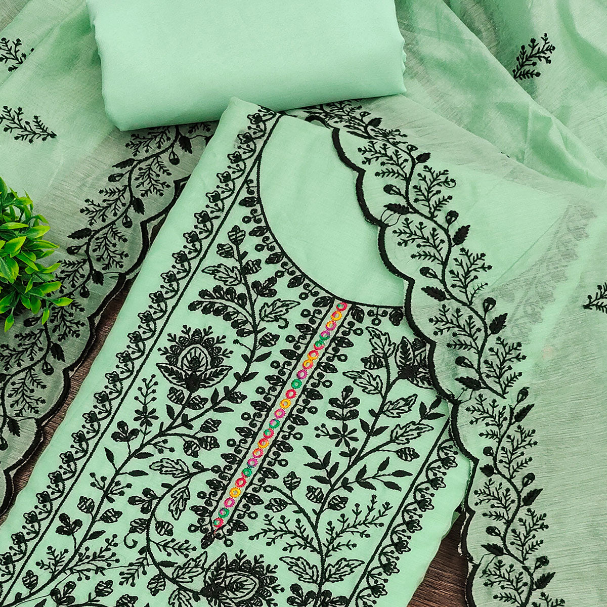 Sea Green Chanderi Cotton Dress Material Accented With Delicate Floral Thread Work