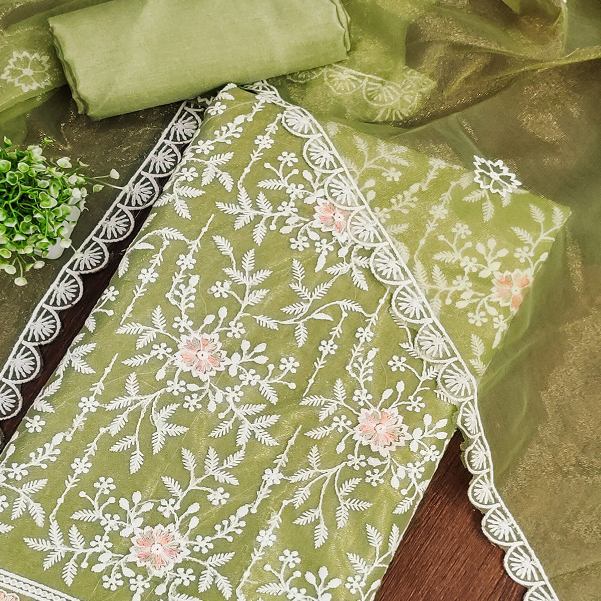 Graceful Green Organza Dress Material Adorned with Intricate Floral Embroidery