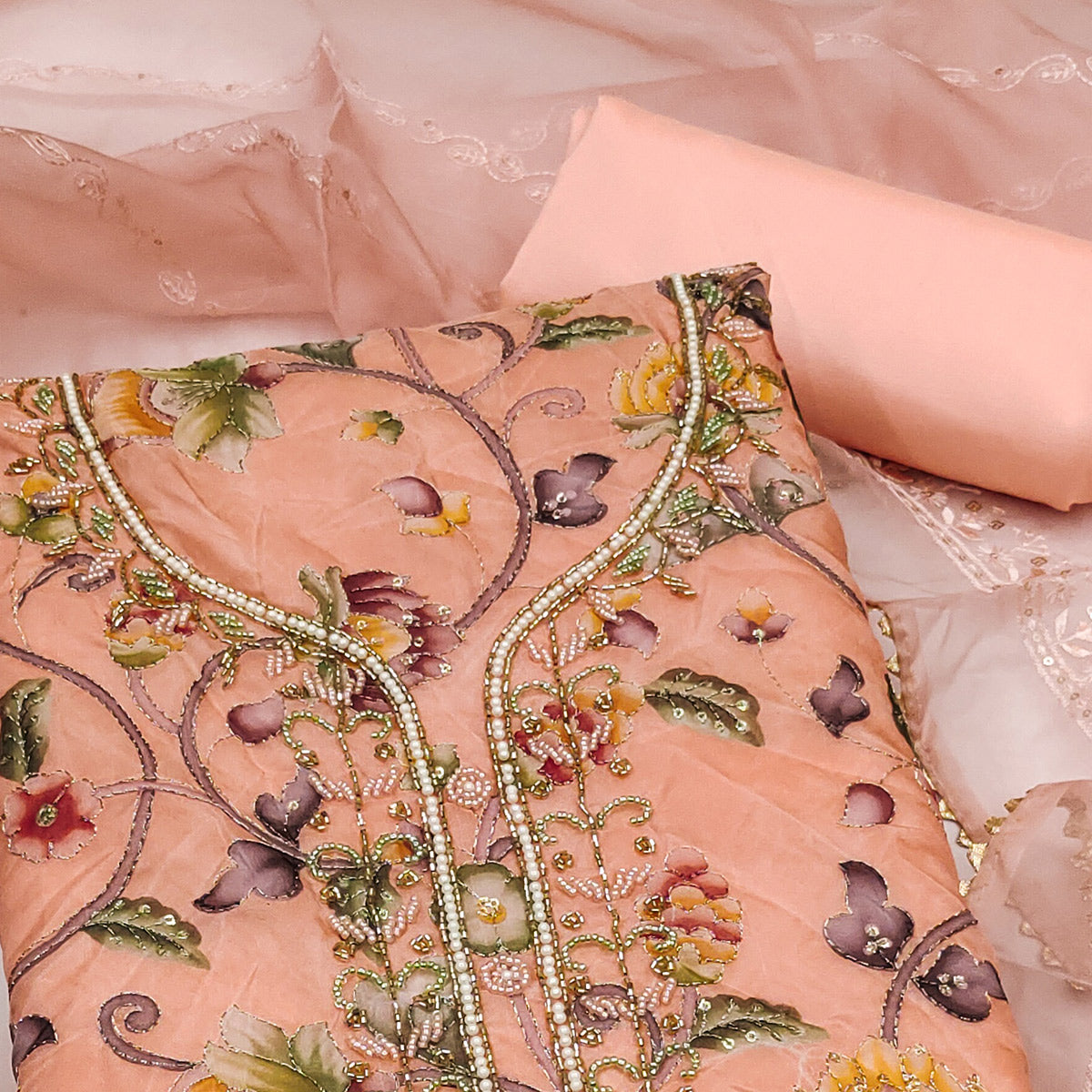 Peach Organza Dress Material With Graceful Floral Print With Handwork Detailing