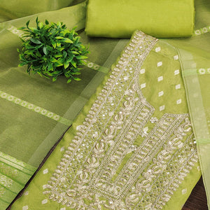 Classic Green Butti Weaving Shimmer Dress Material Enhanced With Sequins Cording Embroidery