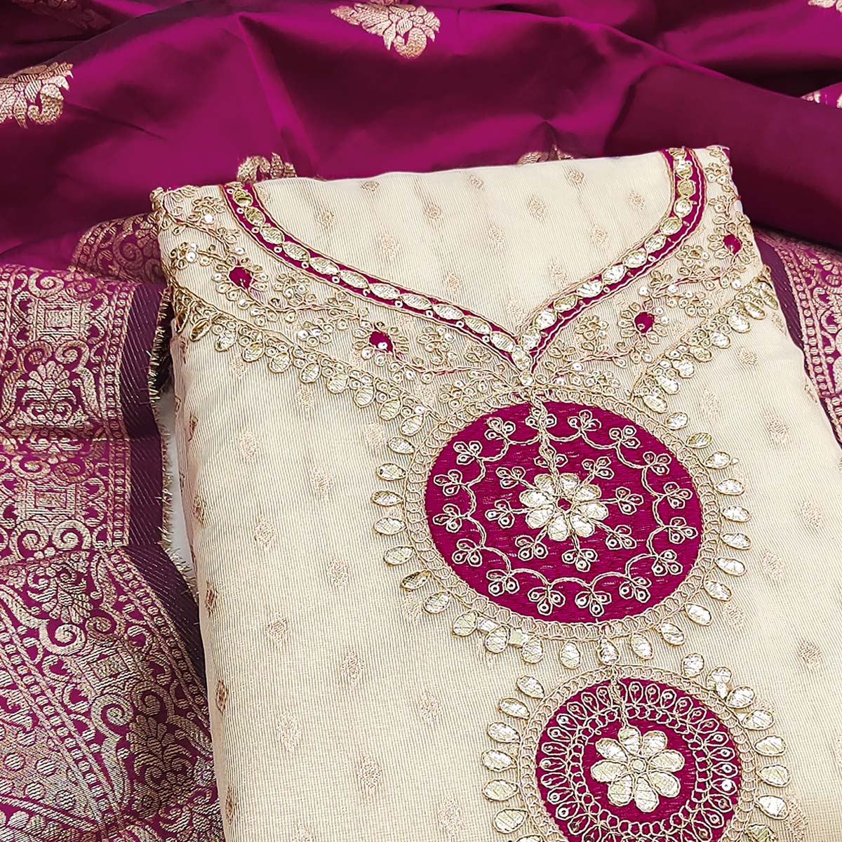 Cream & Wine Shimmer Dress Material Featuring Intricate Zari Weaving With Cording Embroidery