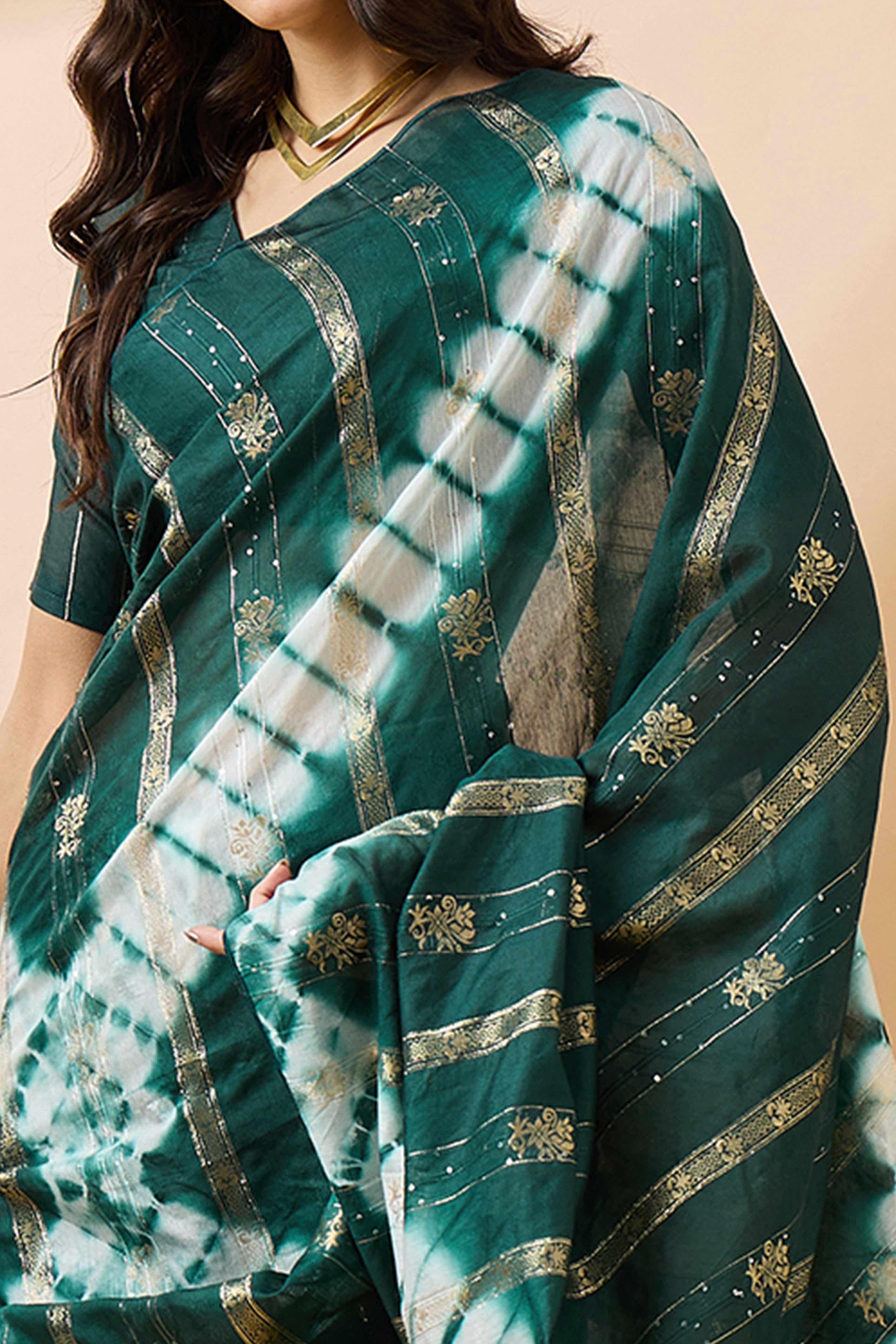 Green Floral Woven Staple Cotton Blend Saree Highlighted With Sequins Embroidery & Tasselled Pallu