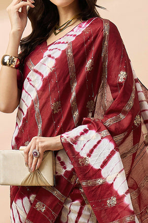 Maroon Floral Woven Staple Cotton Blend Saree Highlighted With Sequins Embroidery & Tasselled Pallu