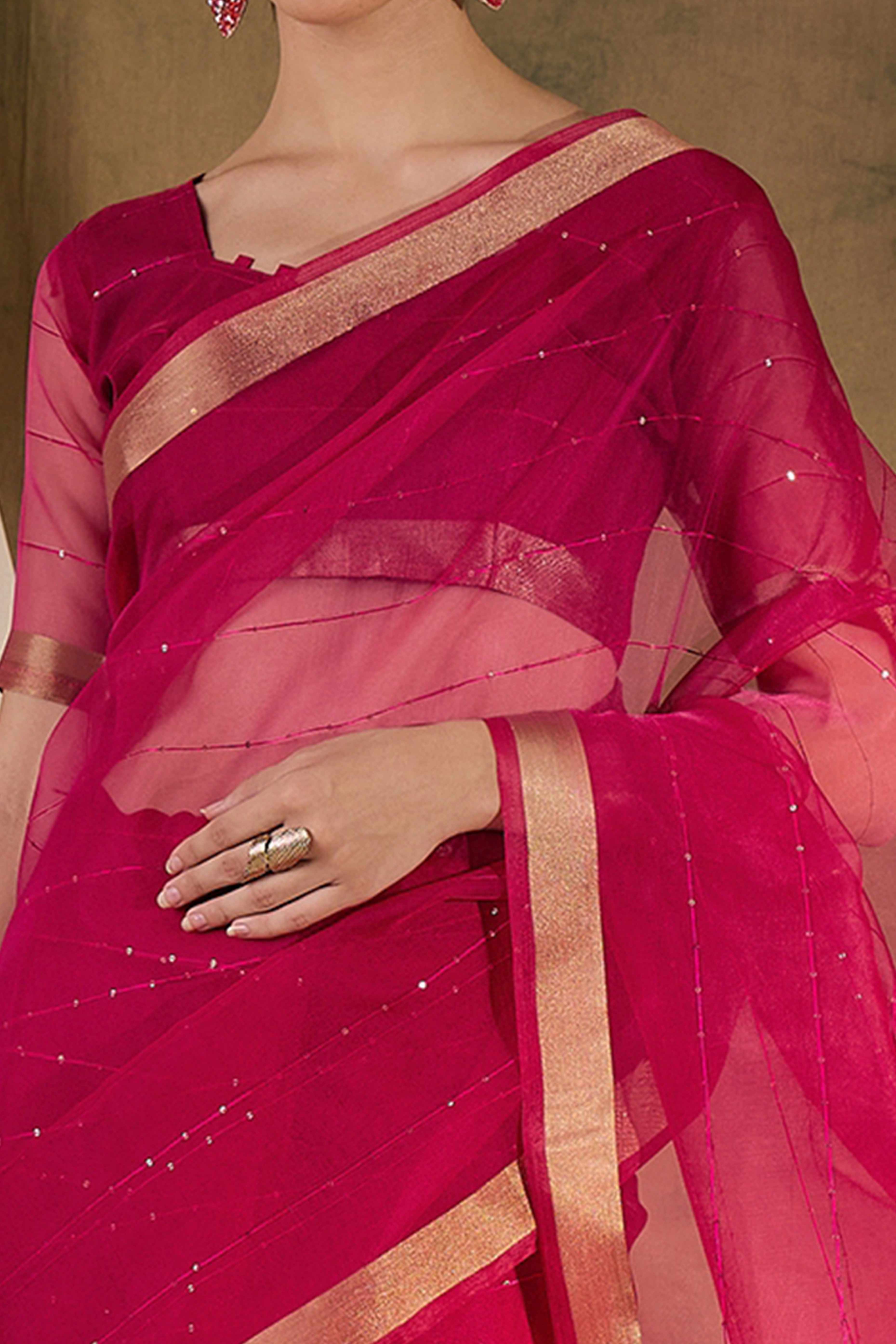 Pink Organza Silk Saree Featuring Shimmering Sequins Embroidery & Elegant Tasselled Pallu
