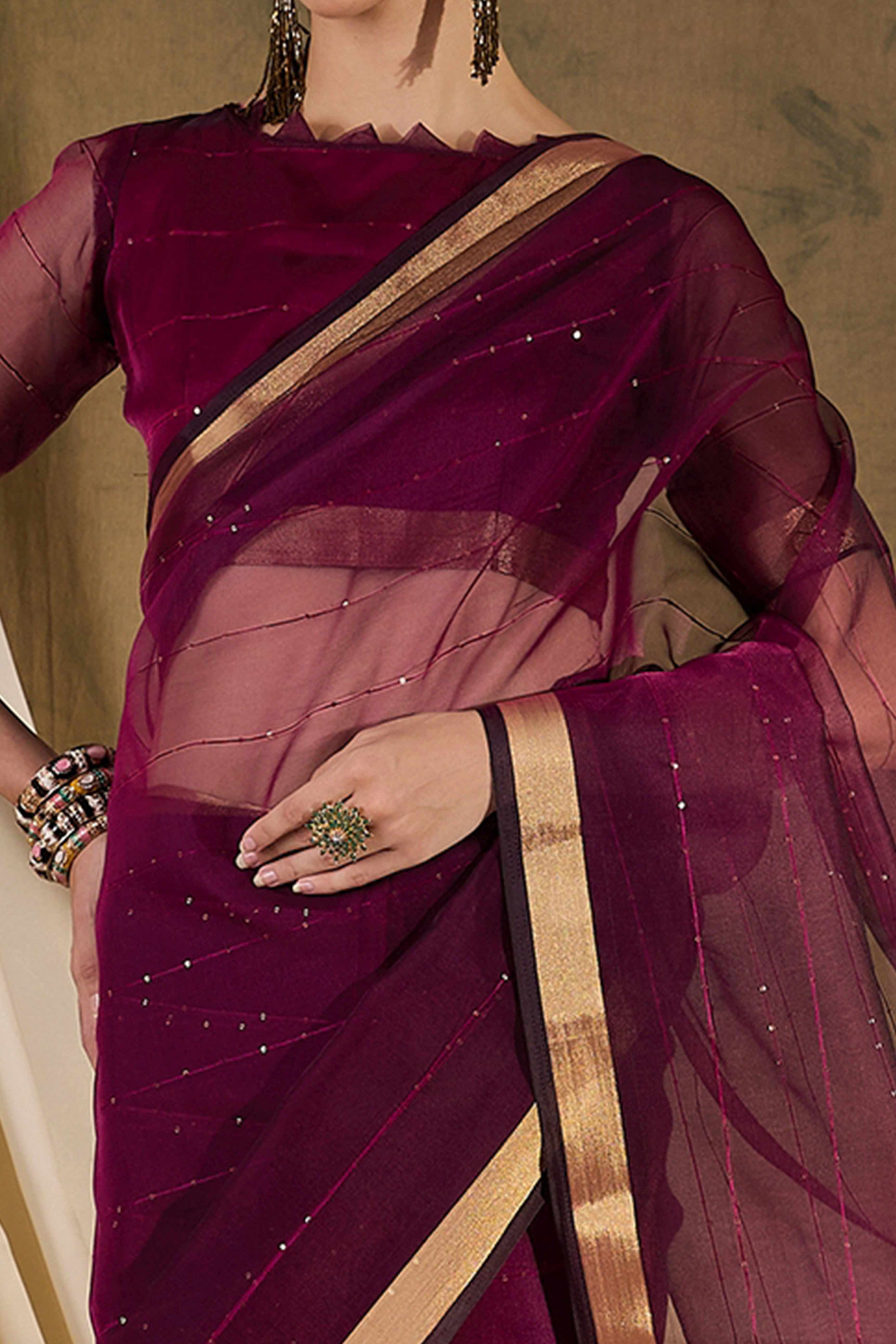 Wine Organza Silk Saree Featuring Shimmering Sequins Embroidery & Elegant Tasselled Pallu