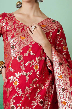 Red Cotton Meena jacquard Saree Featuring Intricate Floral Weaving & Playful Tassels On The Pallu