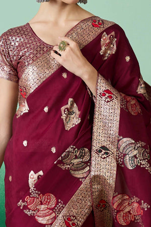 Wine Cotton Blend Saree Adorned With Floral Zari Weaving & Soft Tassel Accents