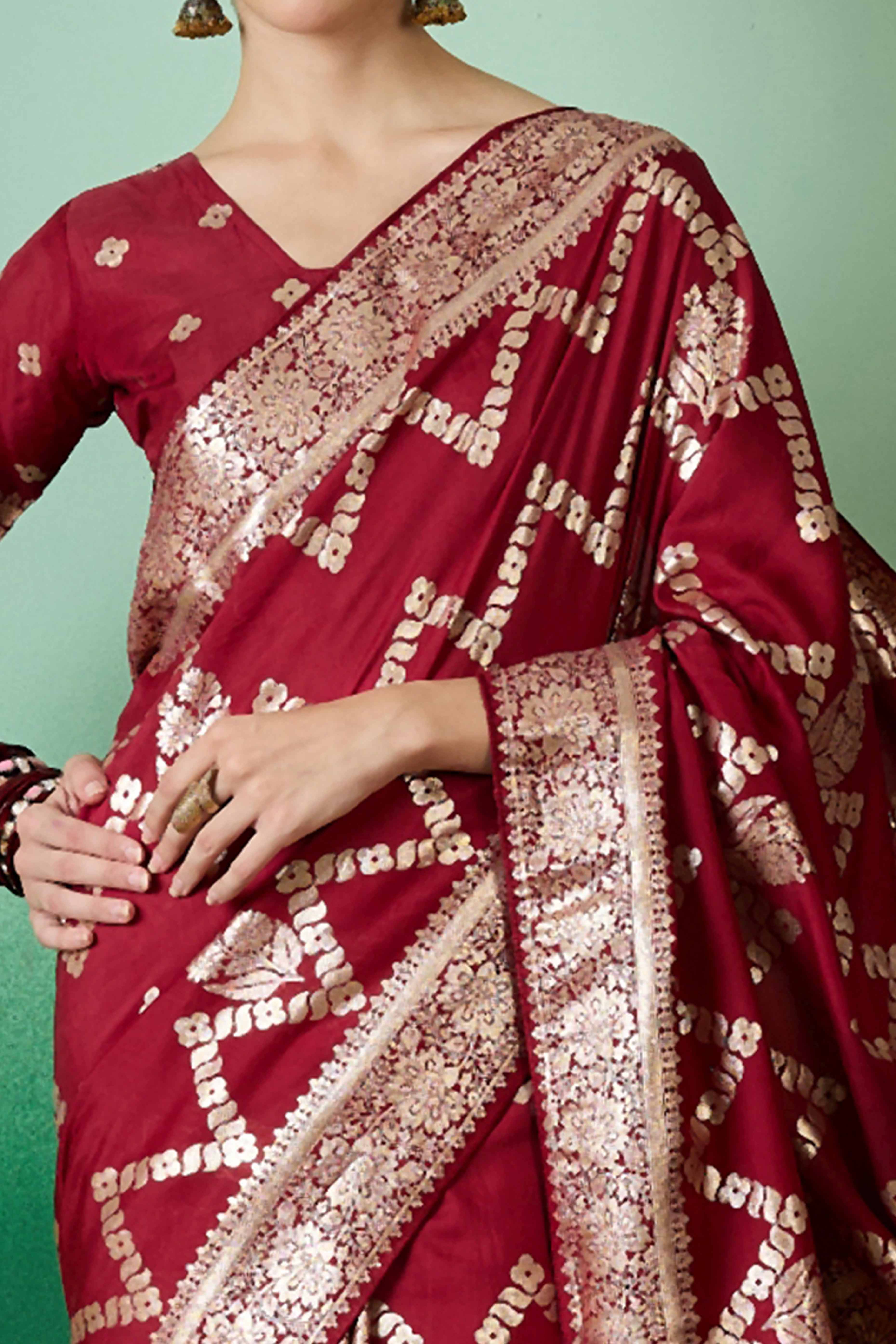 Maroon Cotton Blend Jacquard Saree Adorned With Floral Weaving & Graceful Tassel Pallu