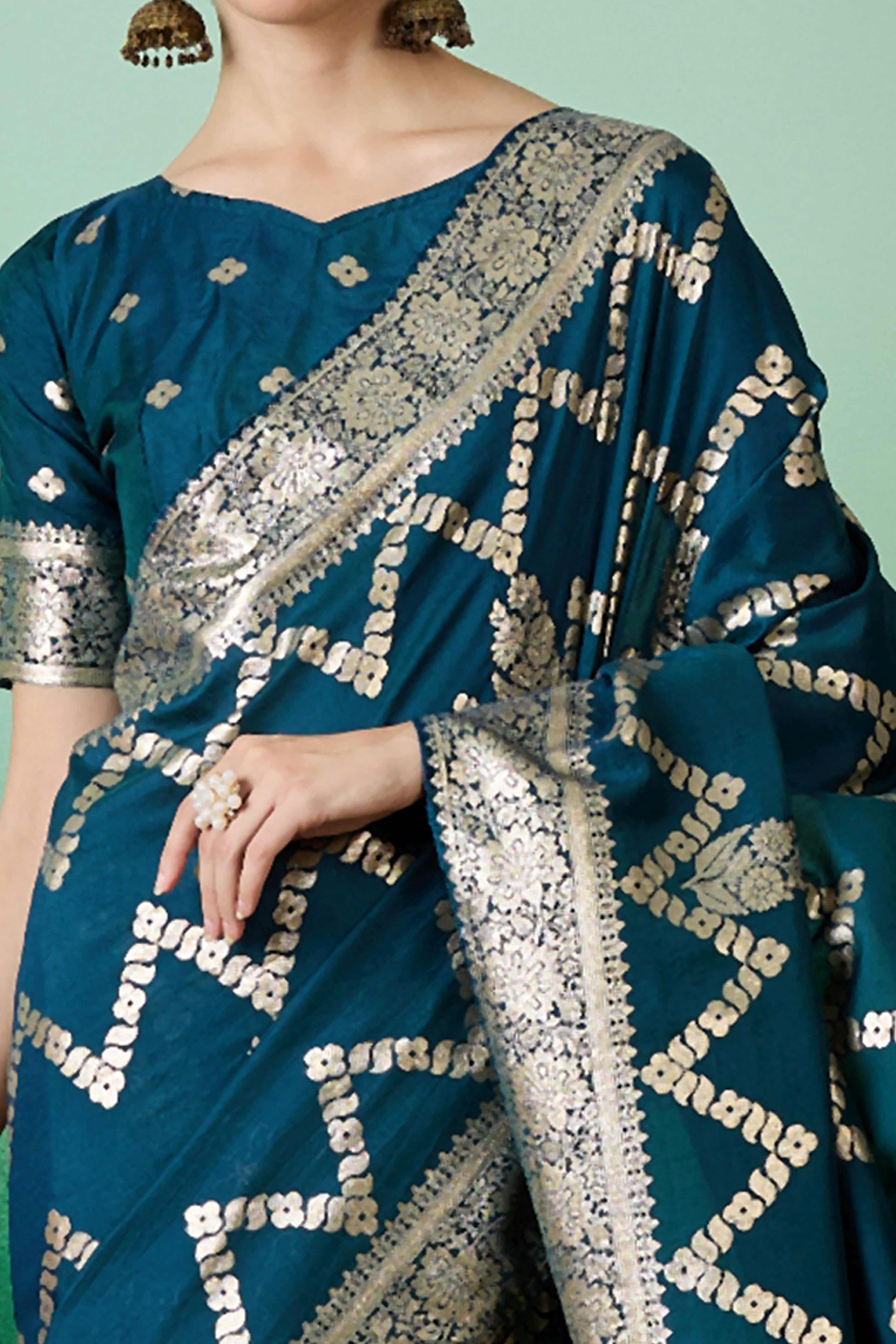 Rich Teal Blue Cotton Blend Jacquard Saree Adorned With Floral Weaving & Graceful Tassel Pallu