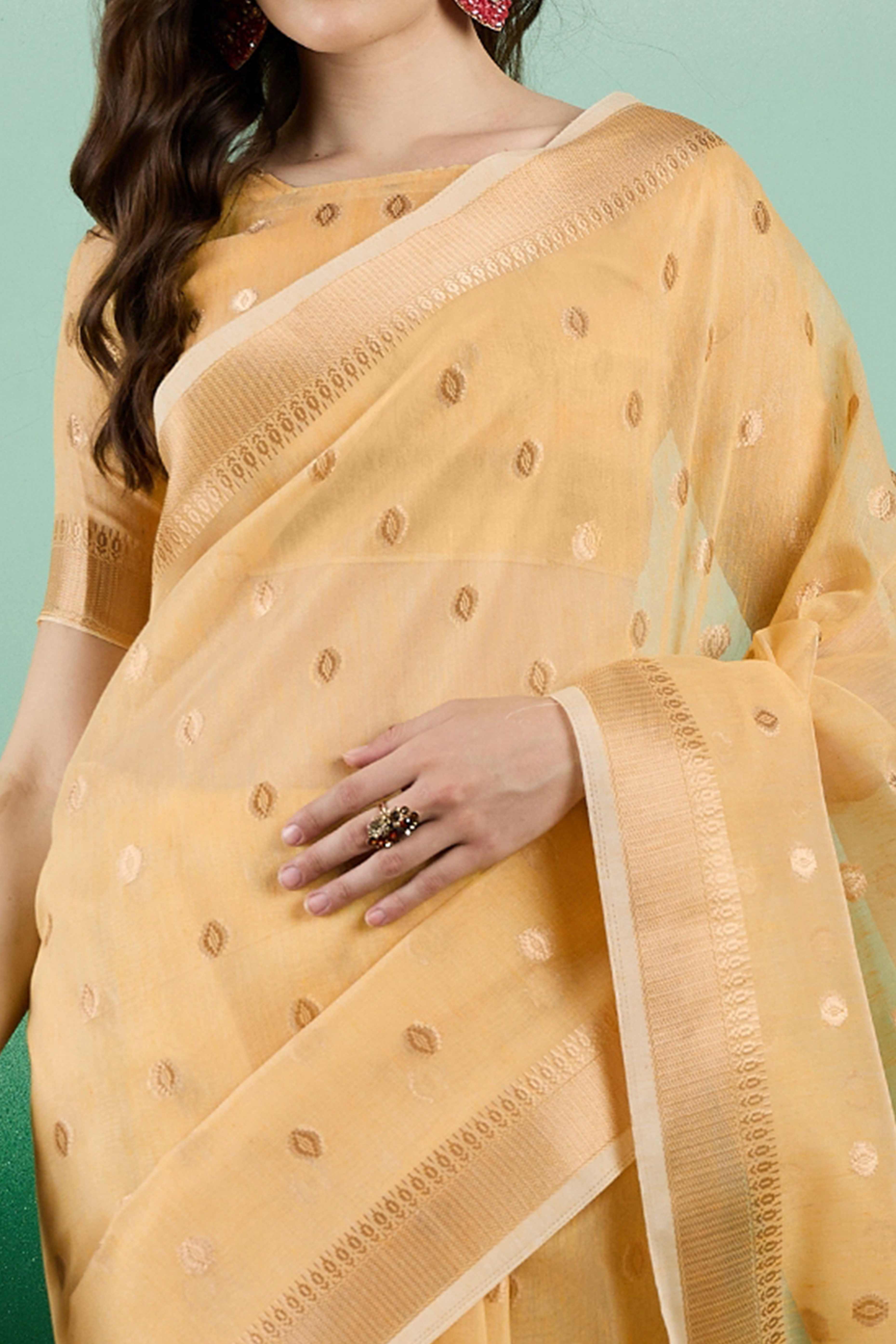 Yellow Khadi Organza Saree Embellished With Traditional Zari Work & Tassels