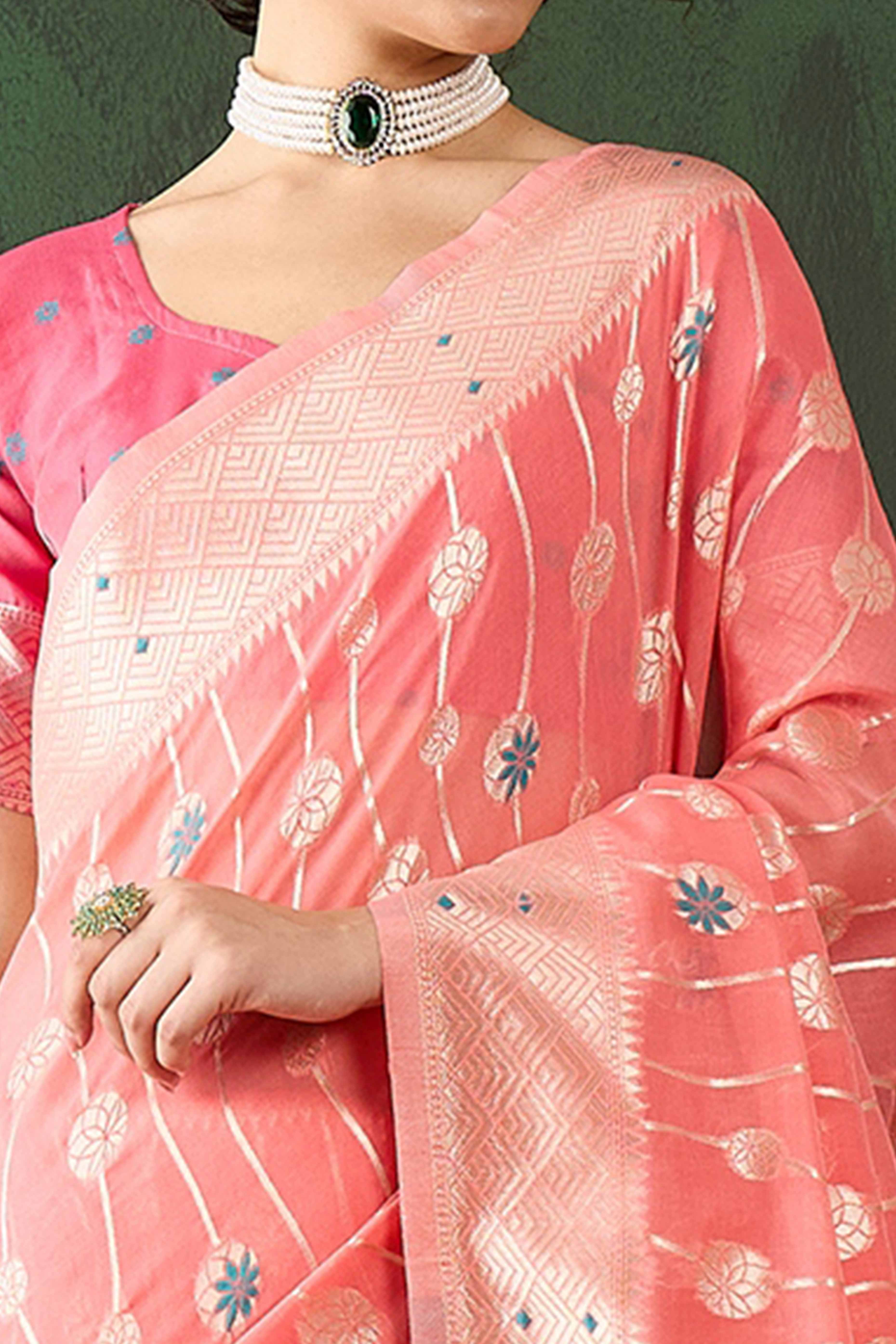 Peach Cotton Blend Saree Adorned With Intricate Floral Zari Weaving & A Stylish Tassel Pallu