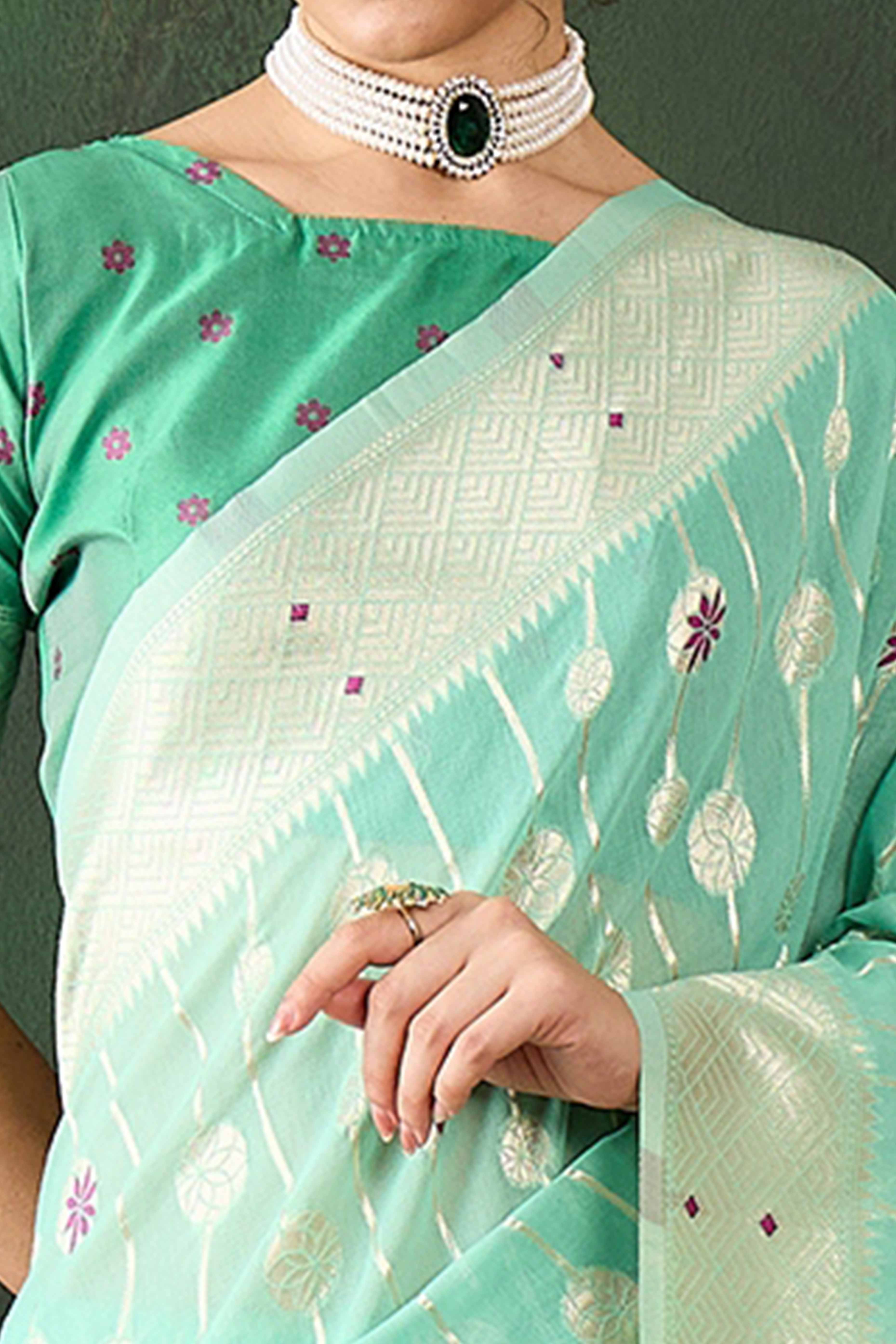 Sea Green Cotton Blend Saree Adorned With Intricate Floral Zari Weaving & A Stylish Tassel Pallu