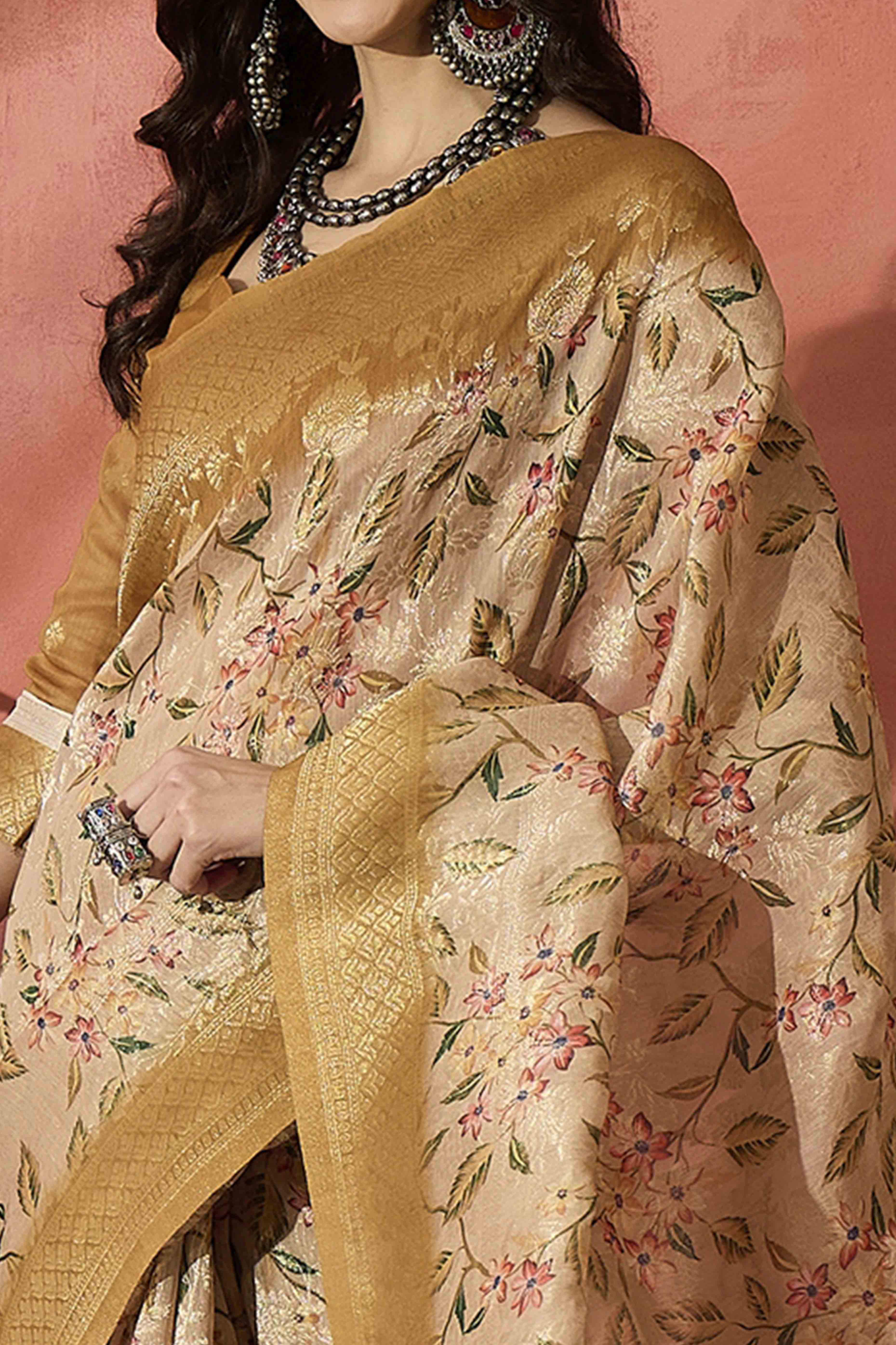 Cream Saree In Poly Cotton Featuring Intricate Floral Zari Weaving & Tassel Accents