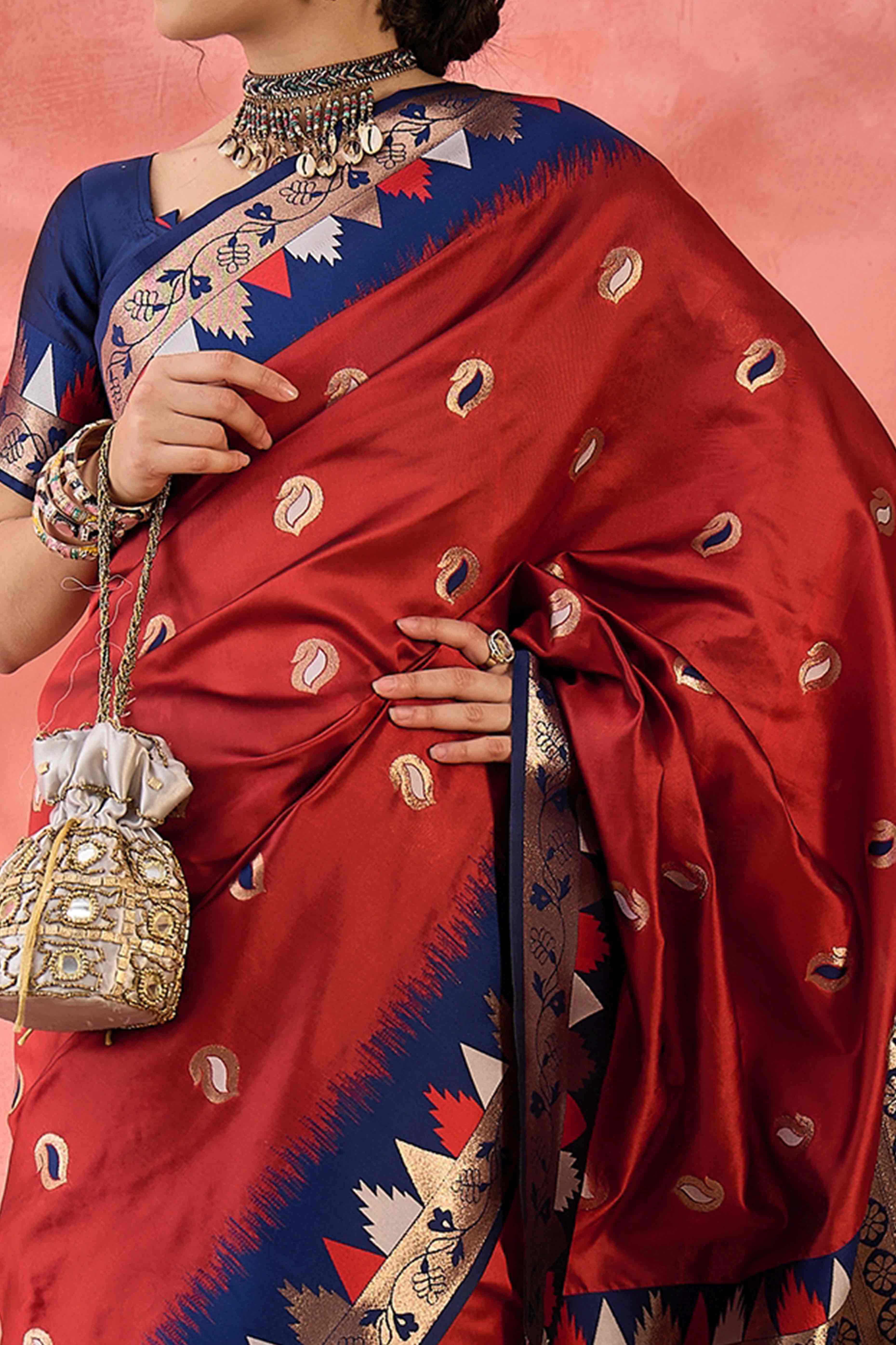 Maroon Zari Woven Poly Silk Saree Enhanced With Graceful Tassel Detailing