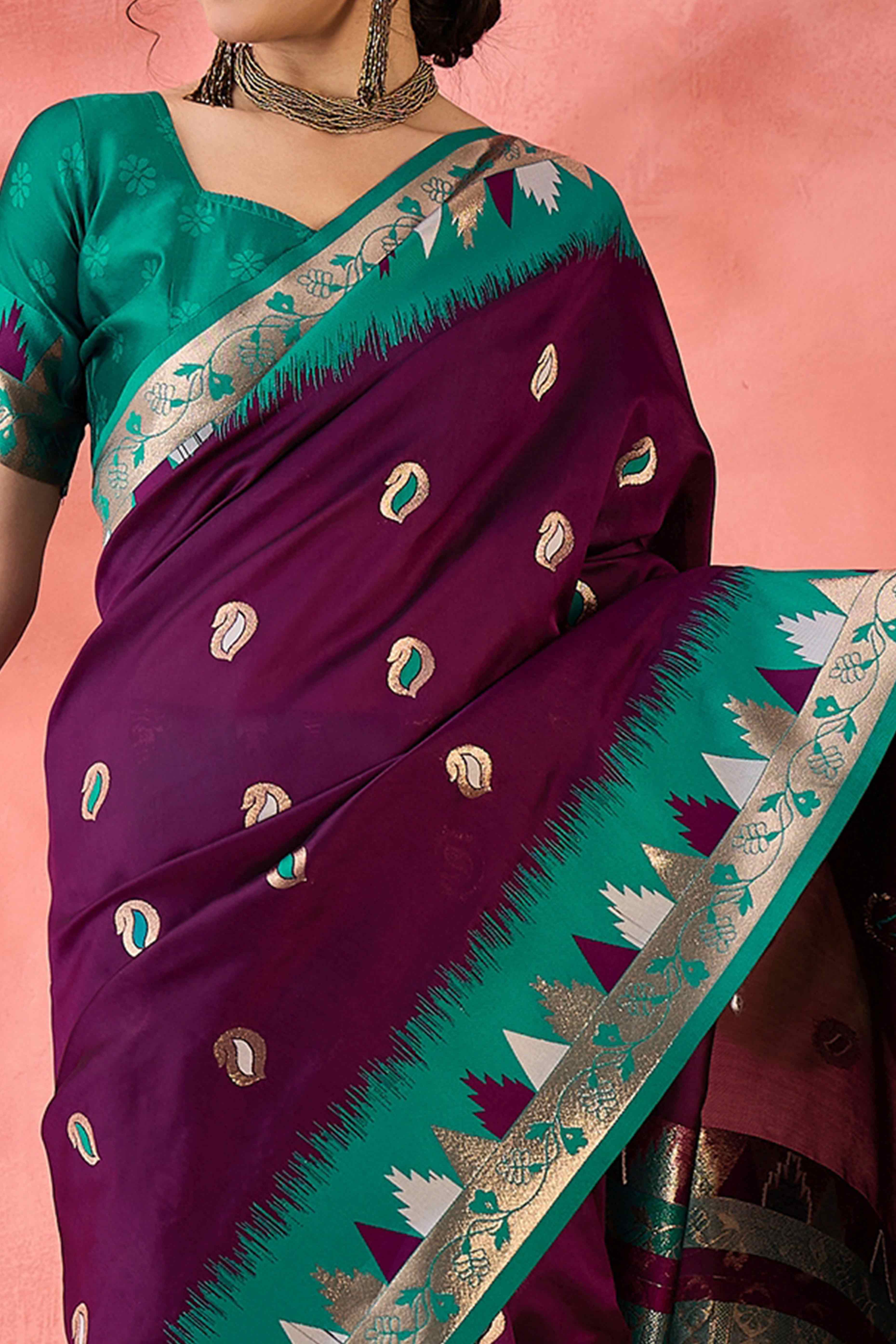 Wine Zari Woven Poly Silk Saree Enhanced With Graceful Tassel Detailing