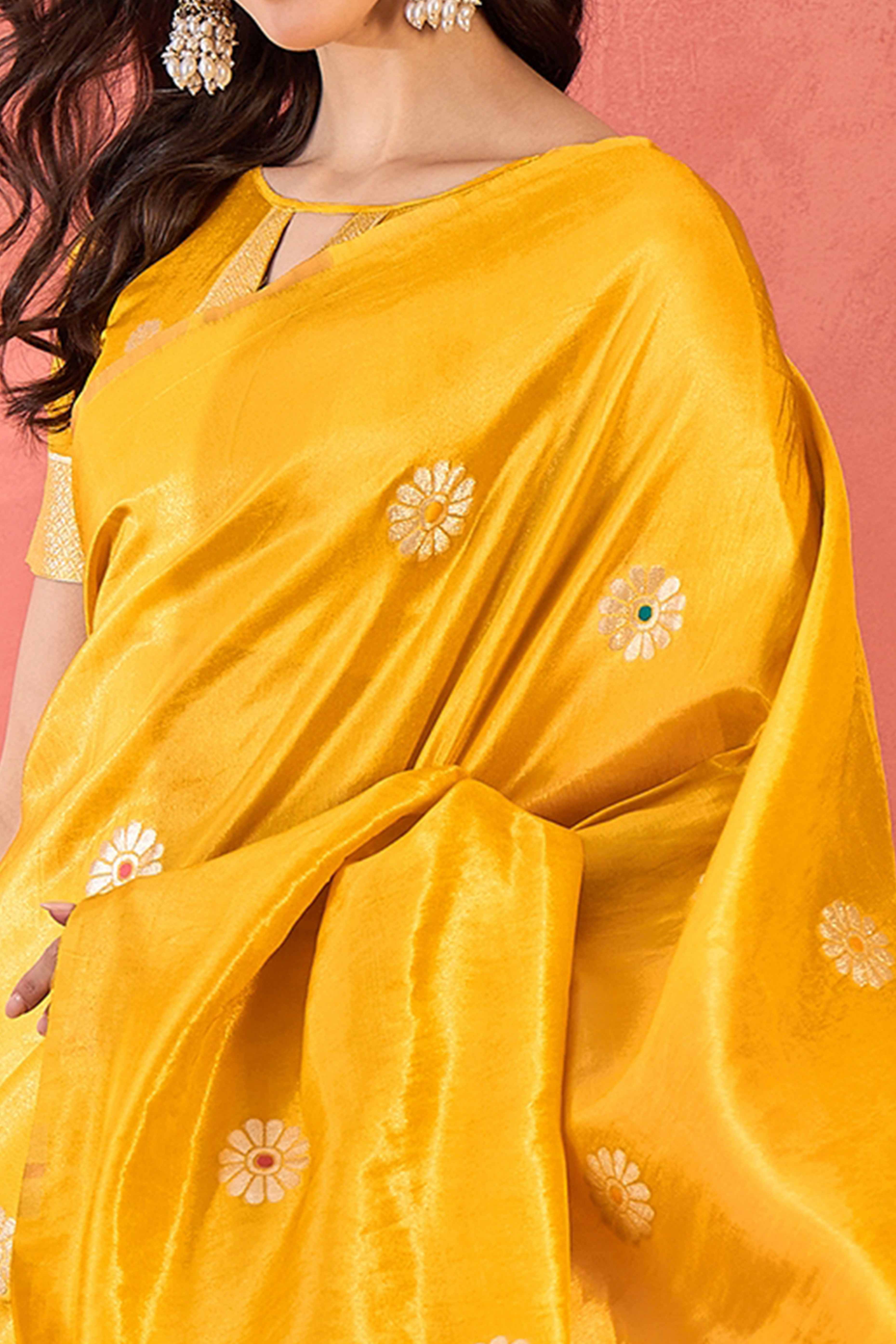 Yellow Shimmer Saree Adorned with Floral Zari Weaving & Tassel Pallu