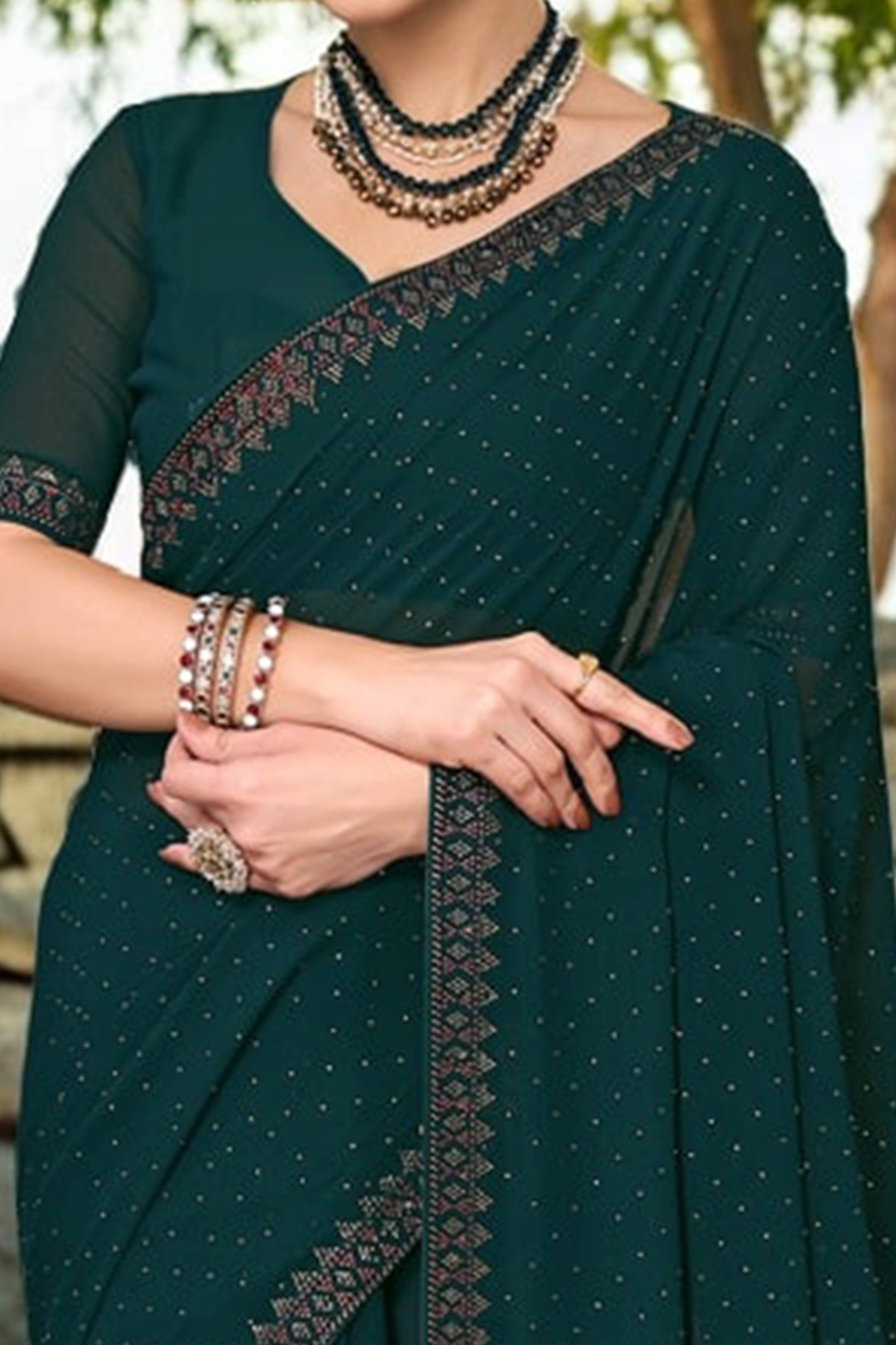 Green Rangoli Dola Silk Saree Embellished With Diamond Work And Elegant Border