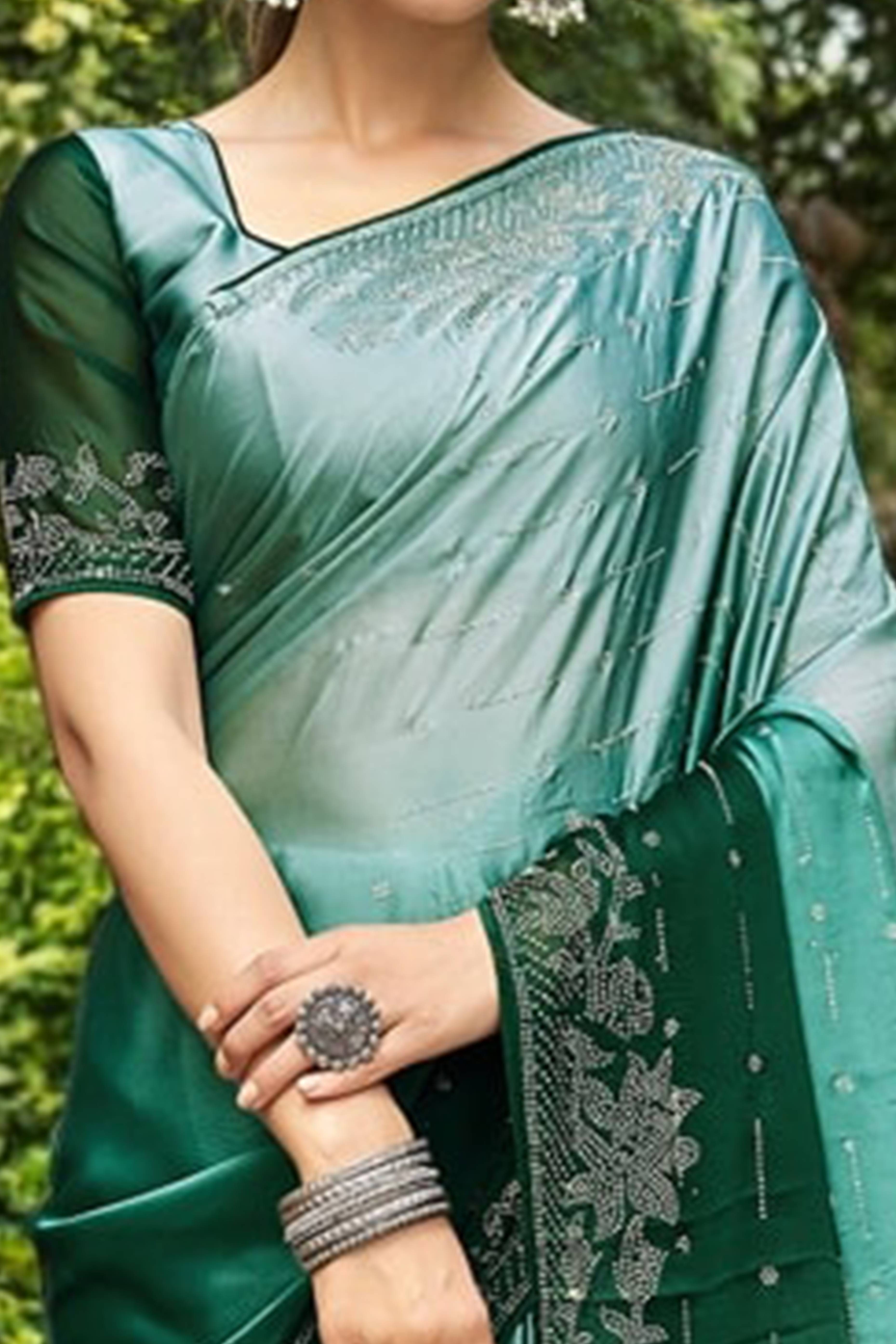 Green Rangoli Dola Silk Saree Adorned With Gleaming Swarovski Work & Classic Floral Border