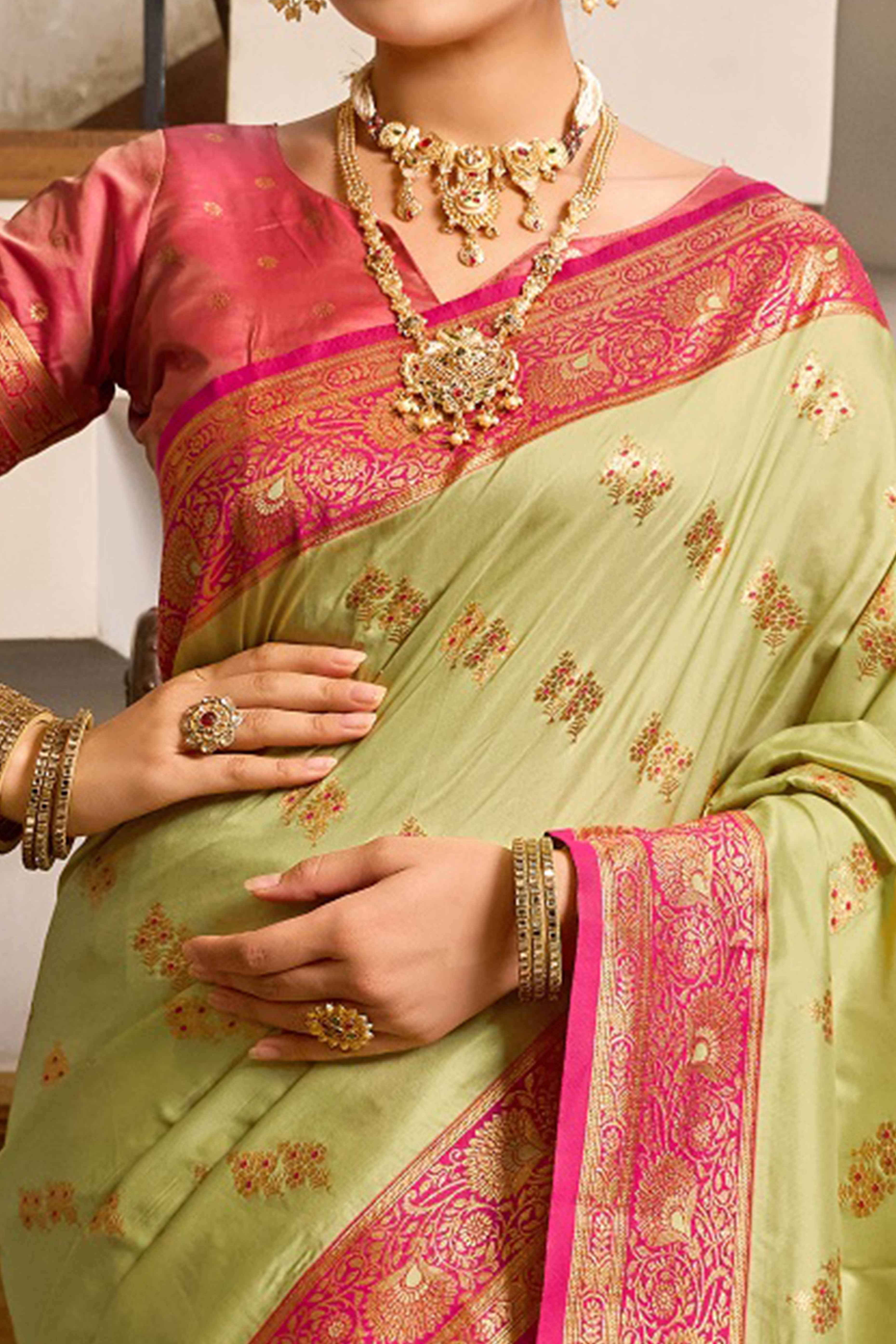 Pista Green Silk Blend Saree Featuring Intricate Floral Zari Work