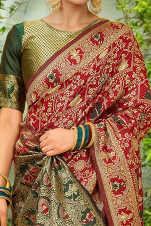 Maroon Paithani Saree In Silk Blend Highlighted With Floral Weaving & Tasselled Edge