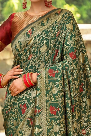 Dark Green Paithani Saree In Silk Blend Highlighted With Floral Weaving & Tasselled Edge