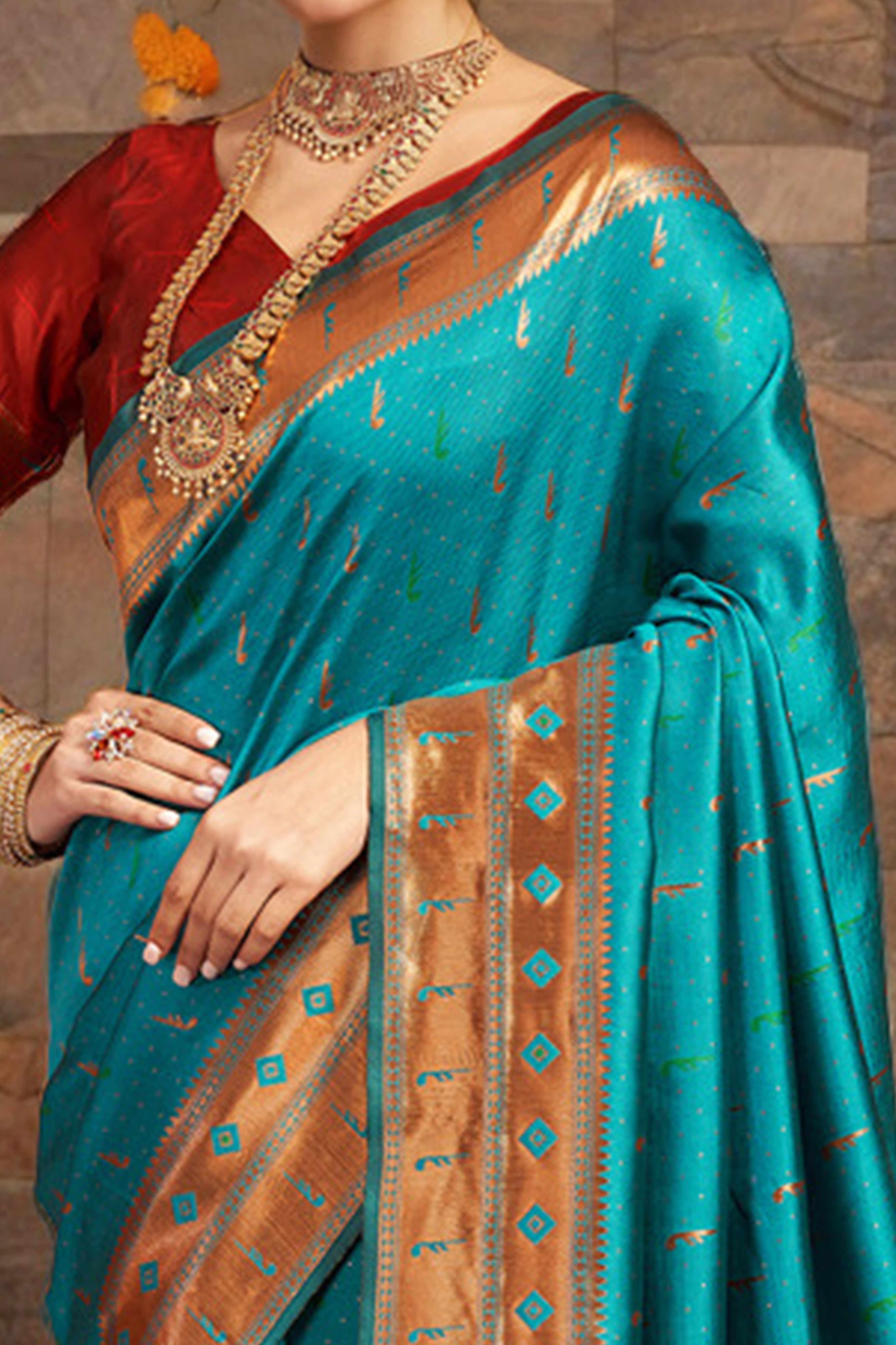 Rama Blue Silk Blend Paithani Saree Adorned With Zari Weaving & Peacock Motif Pallu