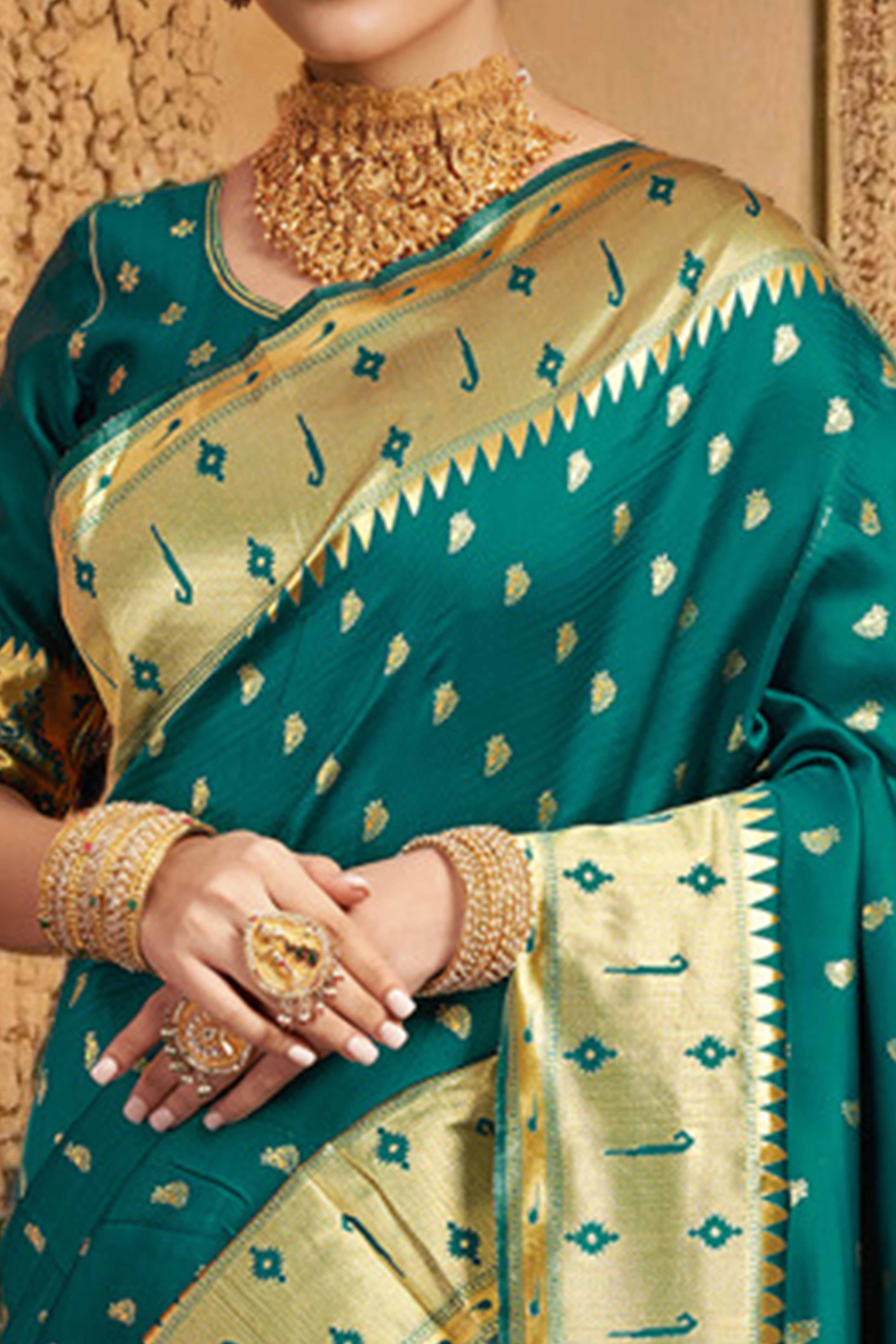 Teal Green Paithani Saree In Silk Blend Highlighted With Zari Woven Peacock & Floral Motifs