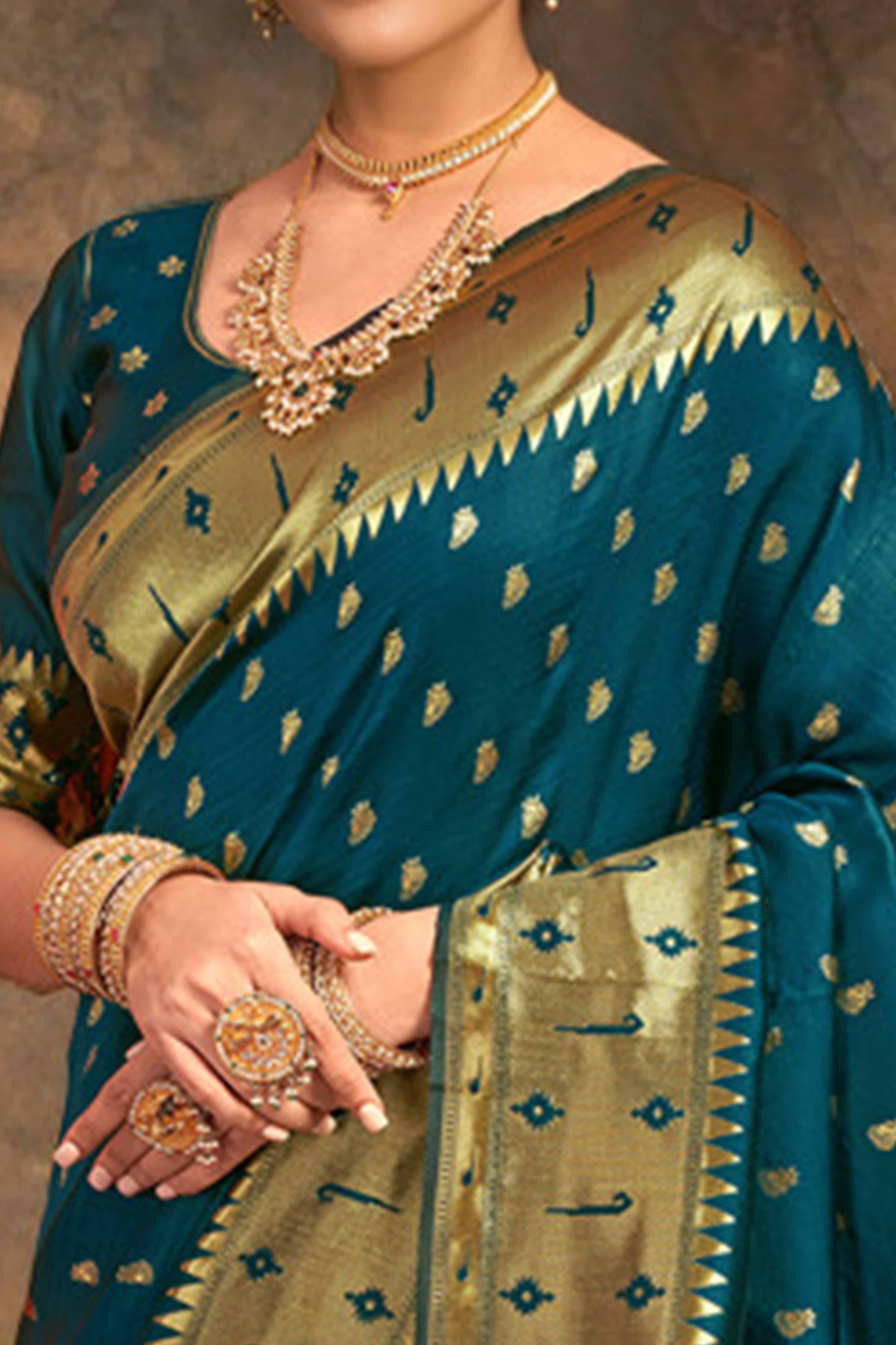 Deep Teal Blue Paithani Saree In Silk Blend Highlighted With Zari Woven Peacock & Floral Motifs