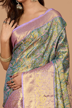 Pista Green Kanjivaram Silk Saree Adorned With Exquisite Floral Zari Weaving