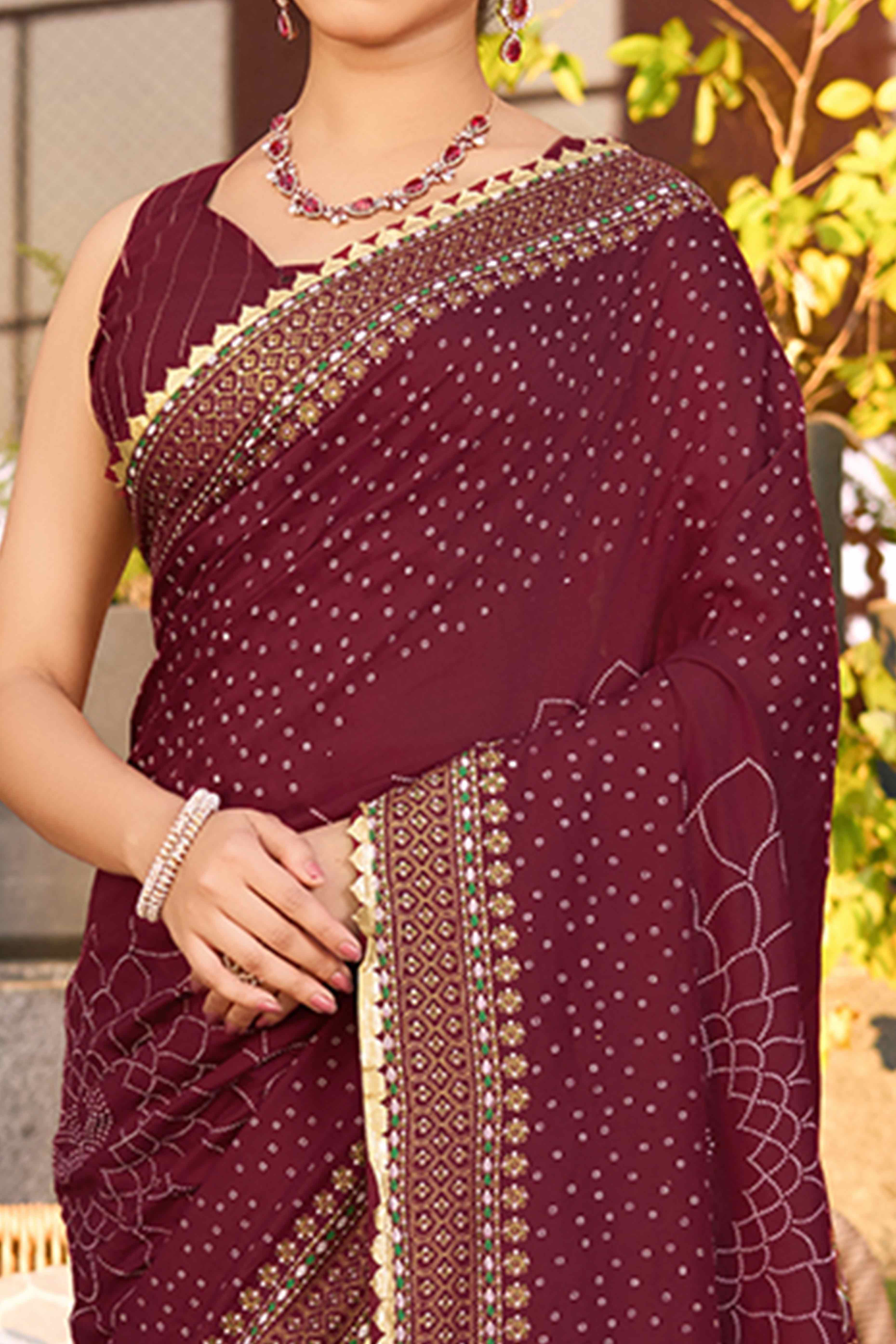 Feel The Luxury Of Maroon Bandhani Foil Printed Cotton Silk Sarree With Lace Border