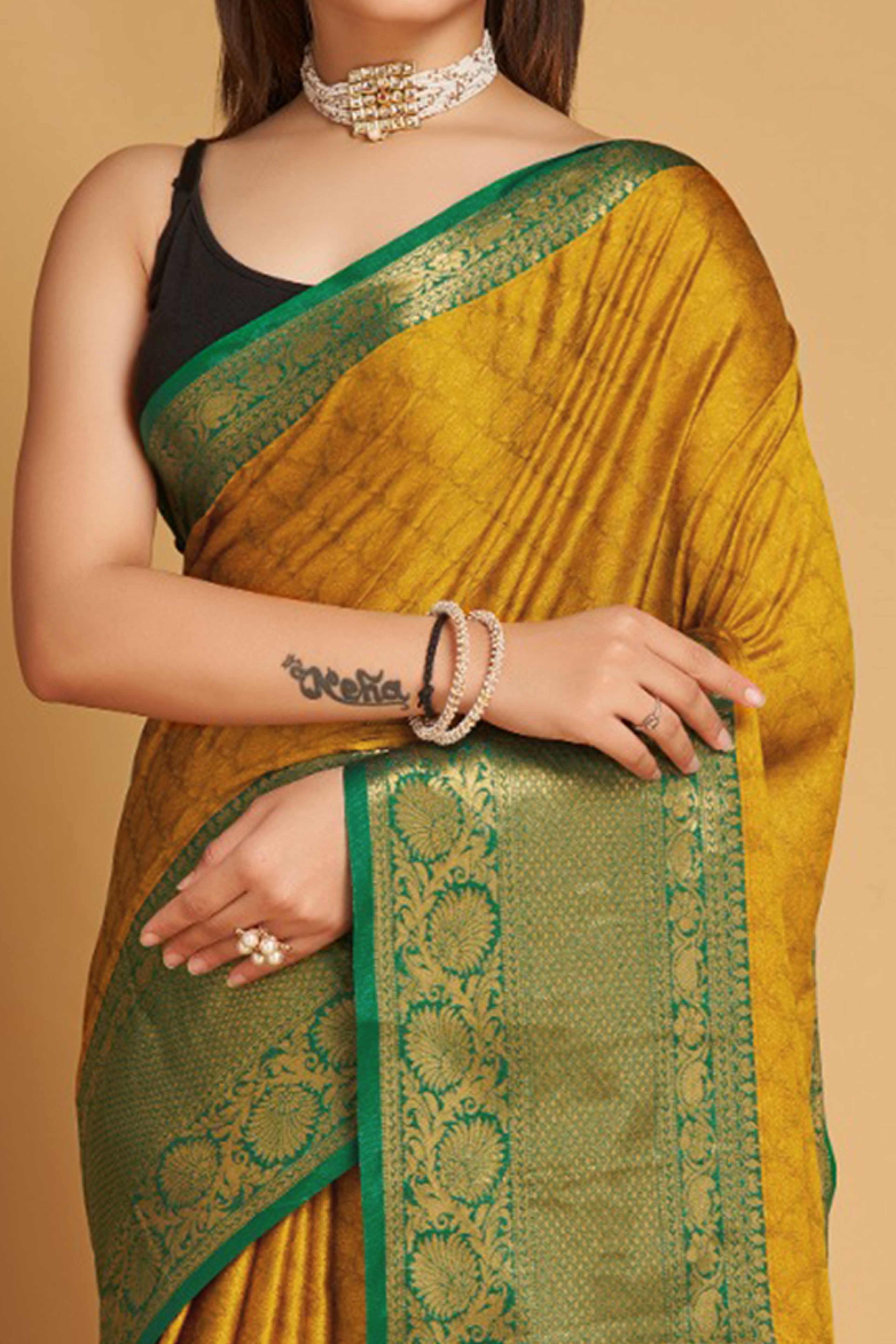 Mustard Silk Blend Saree With Detailed Zari Weaving & Tassel Embellishments