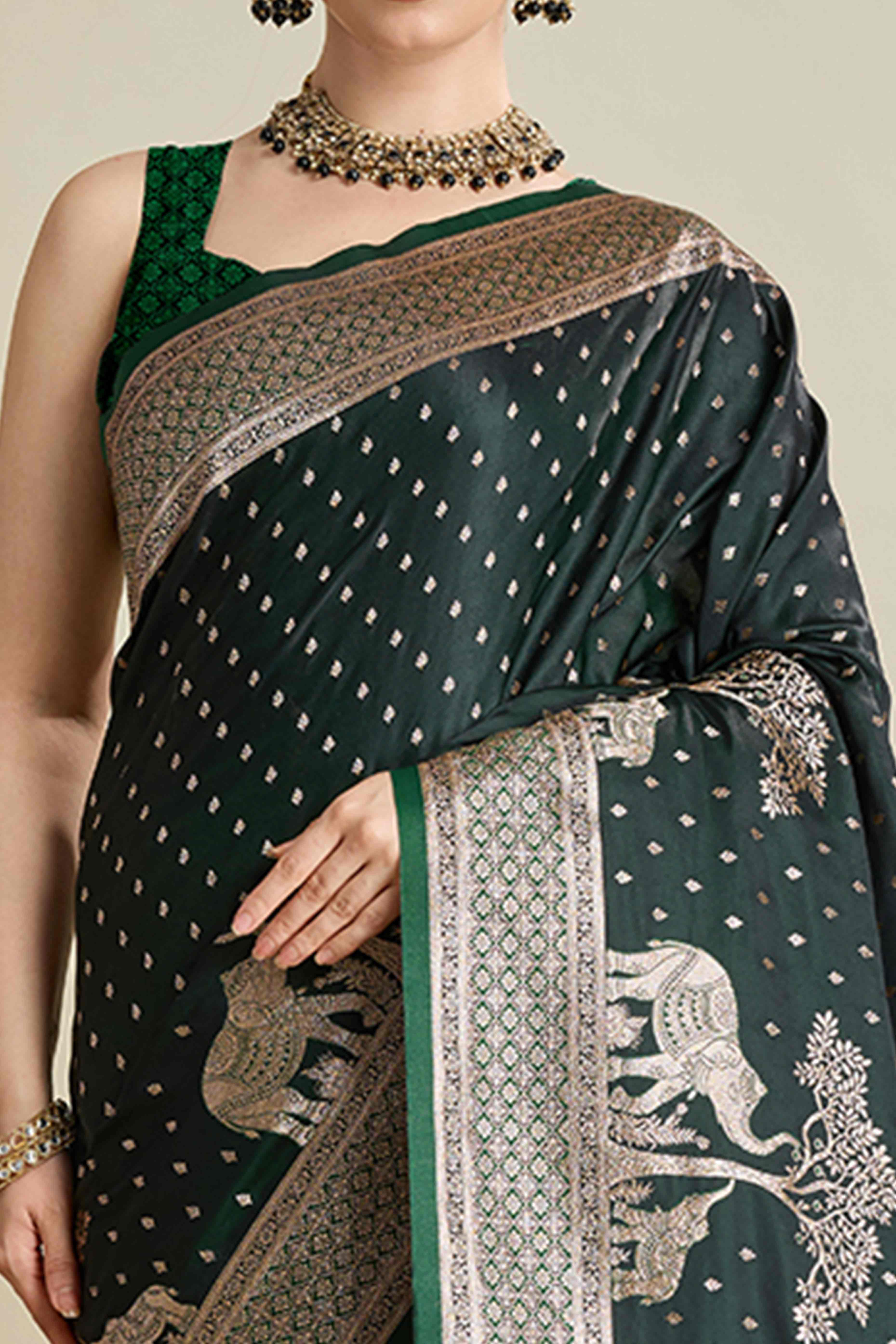 Green Pure Silk Saree Featuring Traditional Banarasi Zari Weaving Patterns
